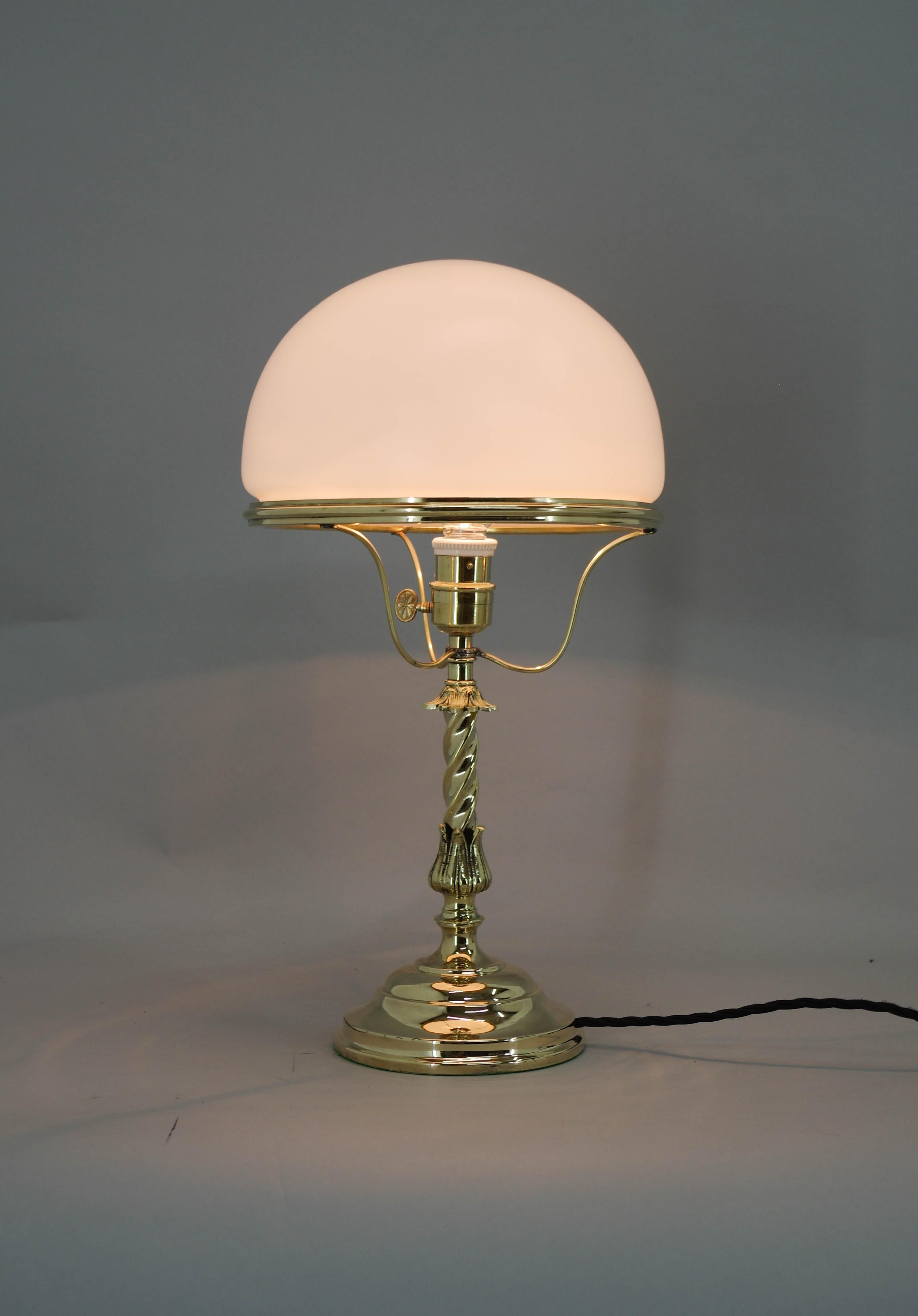 Art Nouveau table lamp made in Austria in 1910s.
Restored: cleaned, polished, rewired
1x40W, E25-E27 bulb
US plug adapter included