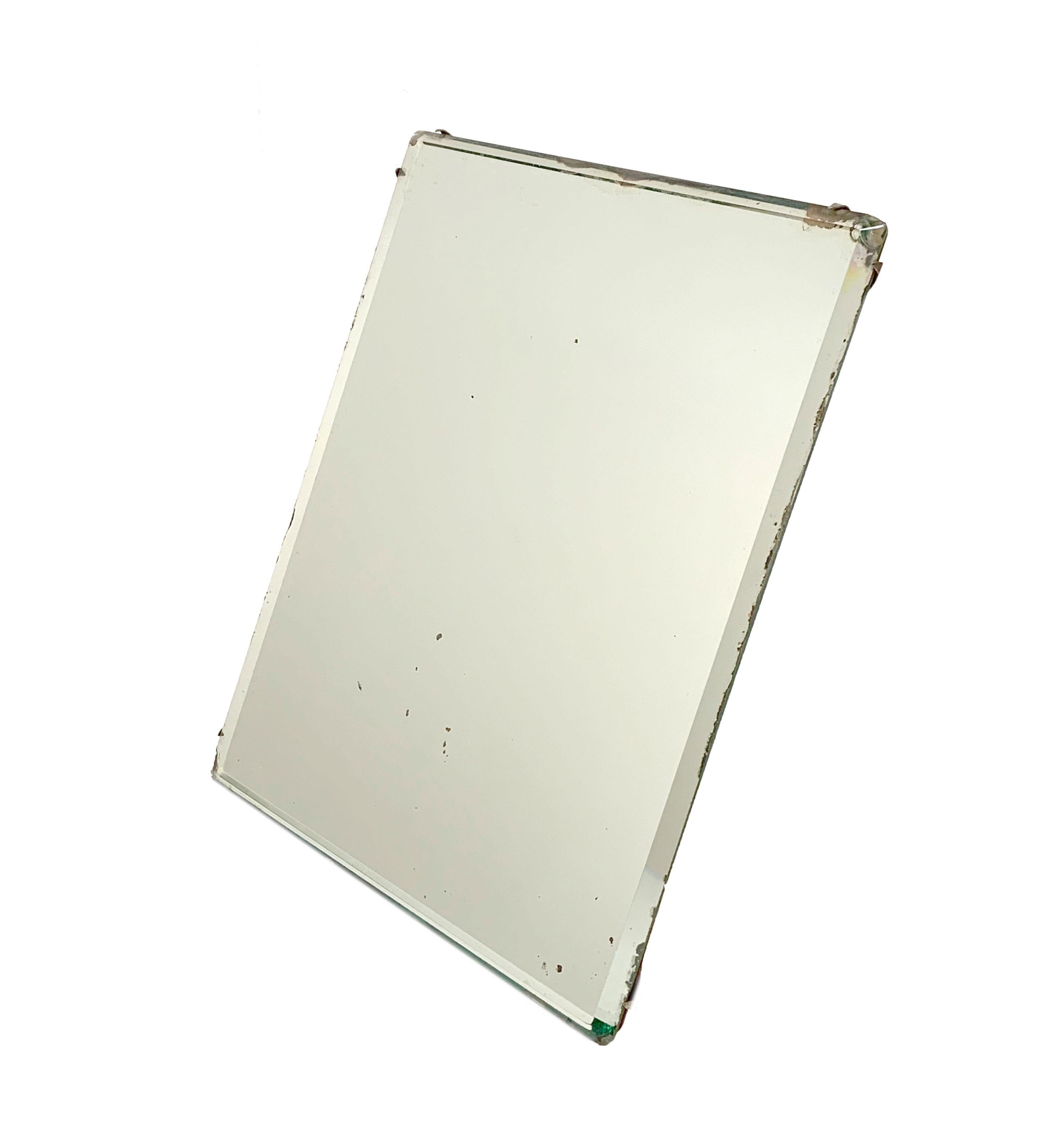 Table or wall mirror. Original vintage conditions. Simple but elegant design. Mirror 12.9 x 10.6 in. has a ground edge, metal corners fixed with old nails. The zipper on the back can be adjusted to support the mirror in the table. A hook can also be