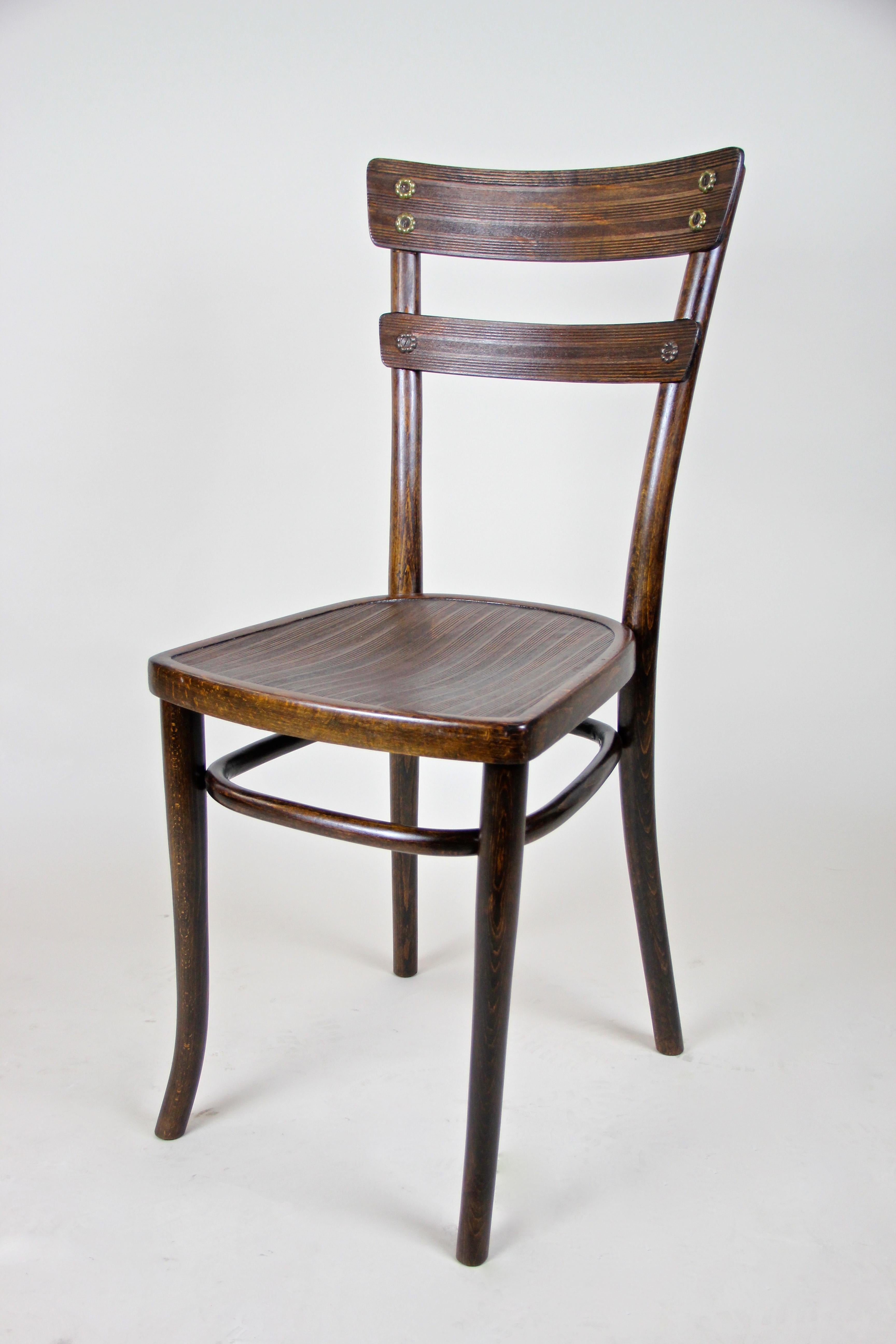 Lovely set of three Art Nouveau Thonet Chairs from the turn of the 20th century in Austria. These slim, elegant designed bentwood chairs were produced in Vienna by the famous company of Thonet circa 1905 and show very nice details like the unusual