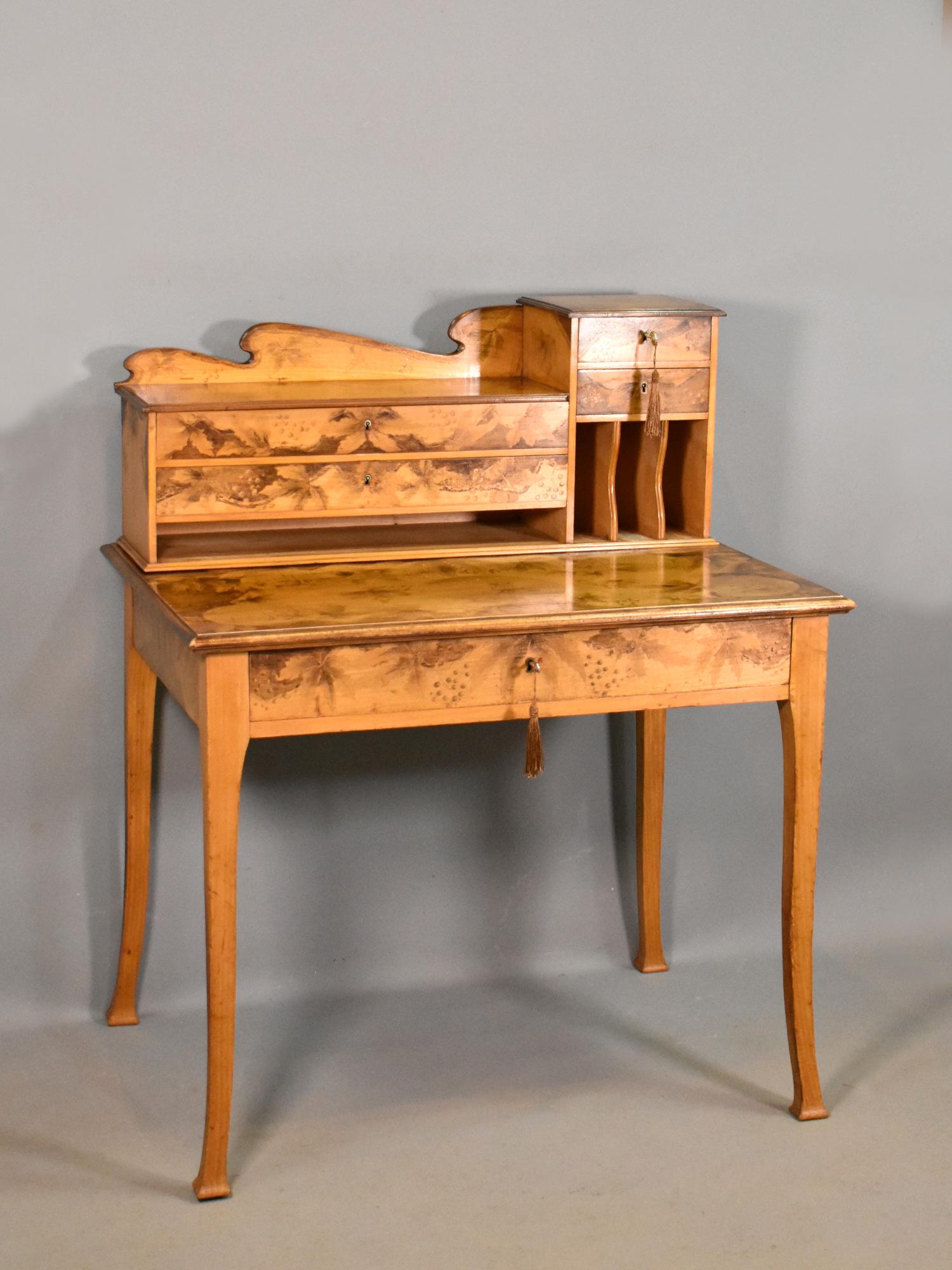Art Nouveau Tiered Pyrography Etched Desk

This stunning Art Nouveau Desk is decorated profusely with pyrography etchings depicting country scenes, including vines, windmills, boats and floral motifs. 

The freestanding smaller storage section