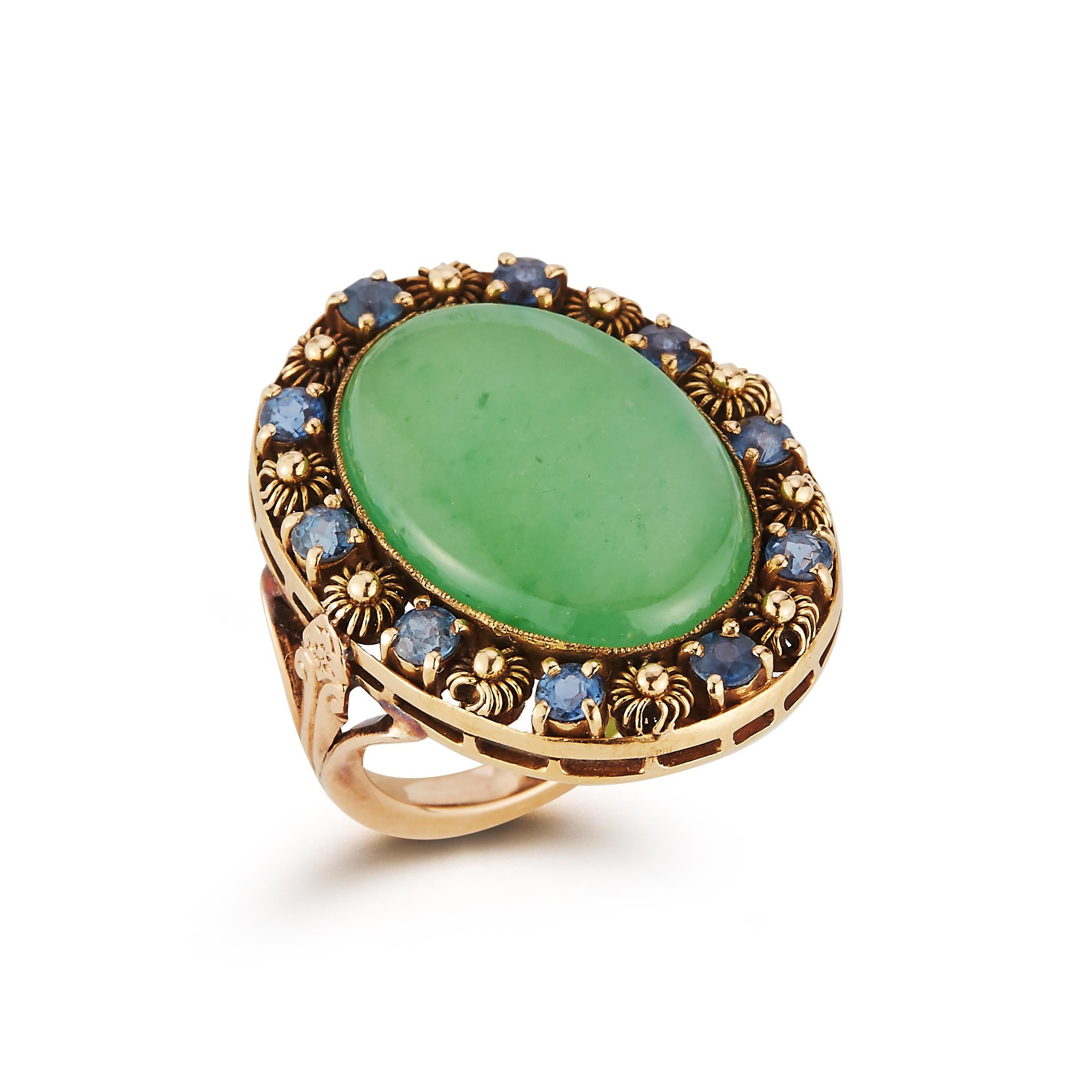 Art Nouveau Tiffany & Co Cabochon Jade & Sapphire Ring

Ring Size: 4.75

Signed, Tiffany & Co.

Gold Type: 18K Yellow Gold

From the legendary Louis Comfort Tiffany era