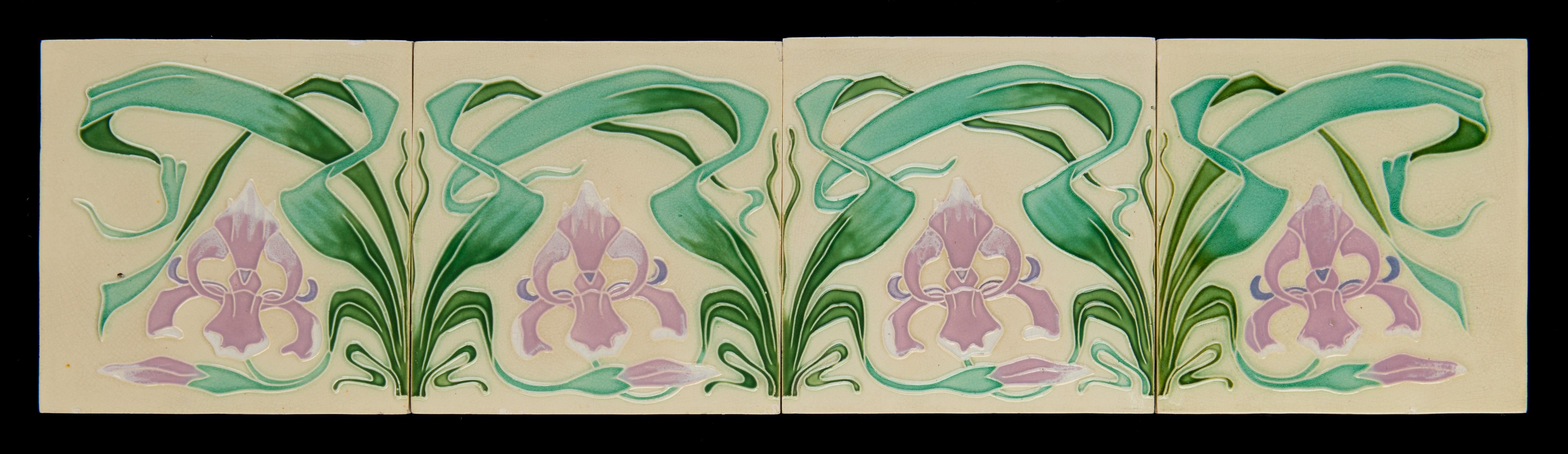 A set of four beautiful art nouveau wall tiles in a wooden frame.
Each individual tile is approximately 8