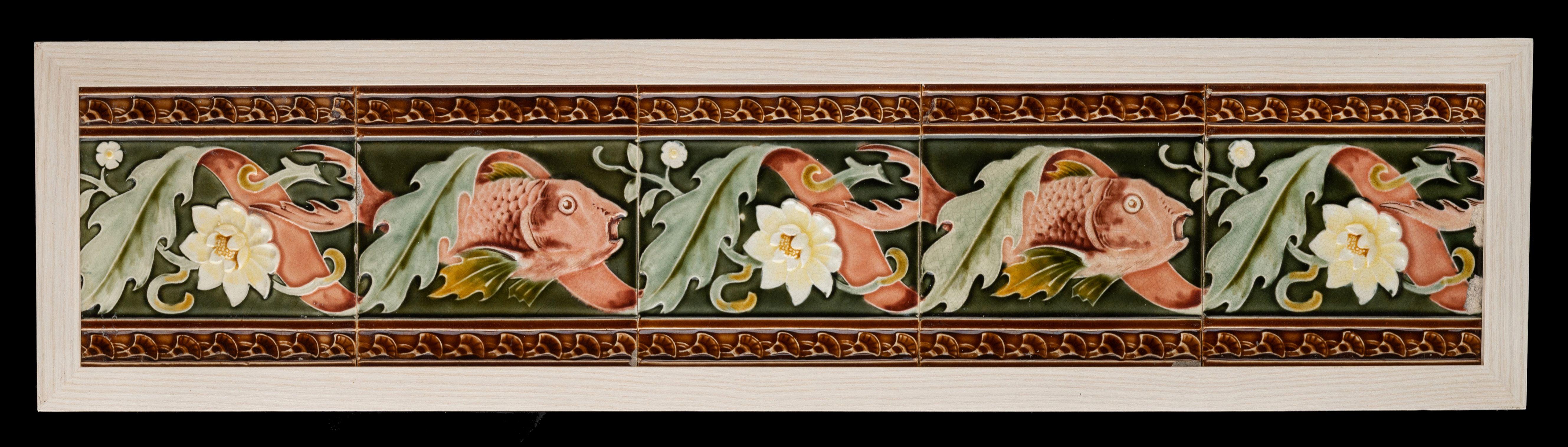 A set of five beautiful art nouveau wall tiles in a wooden frame.
Each individual tile is approximately 6