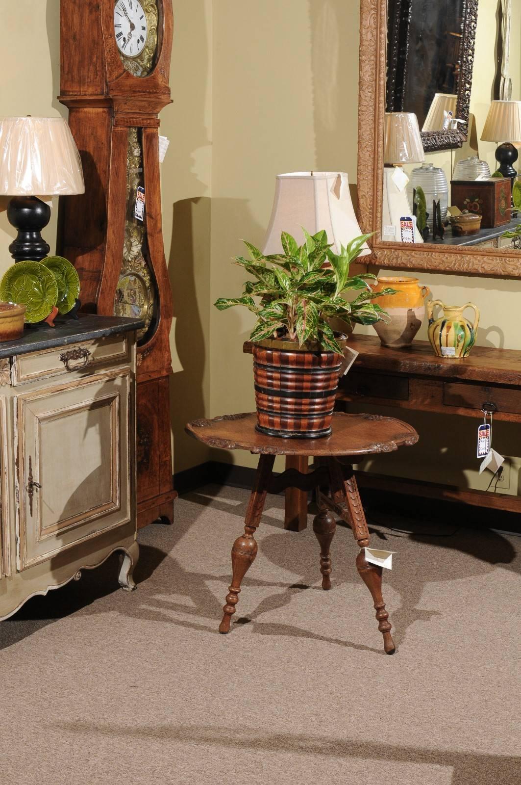 Art Nouveau tilt-top oak table from France

This small table would add some country charm to a casual room.