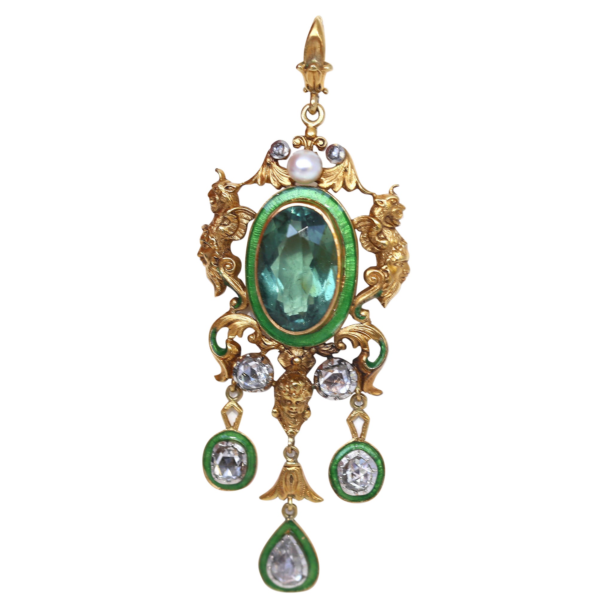 Art Nouveau Tourmaline Enamel Diamonds Yellow Gold Pendant. Created around 1890.
A massive Art Nouveau Pendant with Tourmaline and matching in color bright green Enamel and three old cut Diamonds. Mounted in Yellow Gold. The attention to detail is