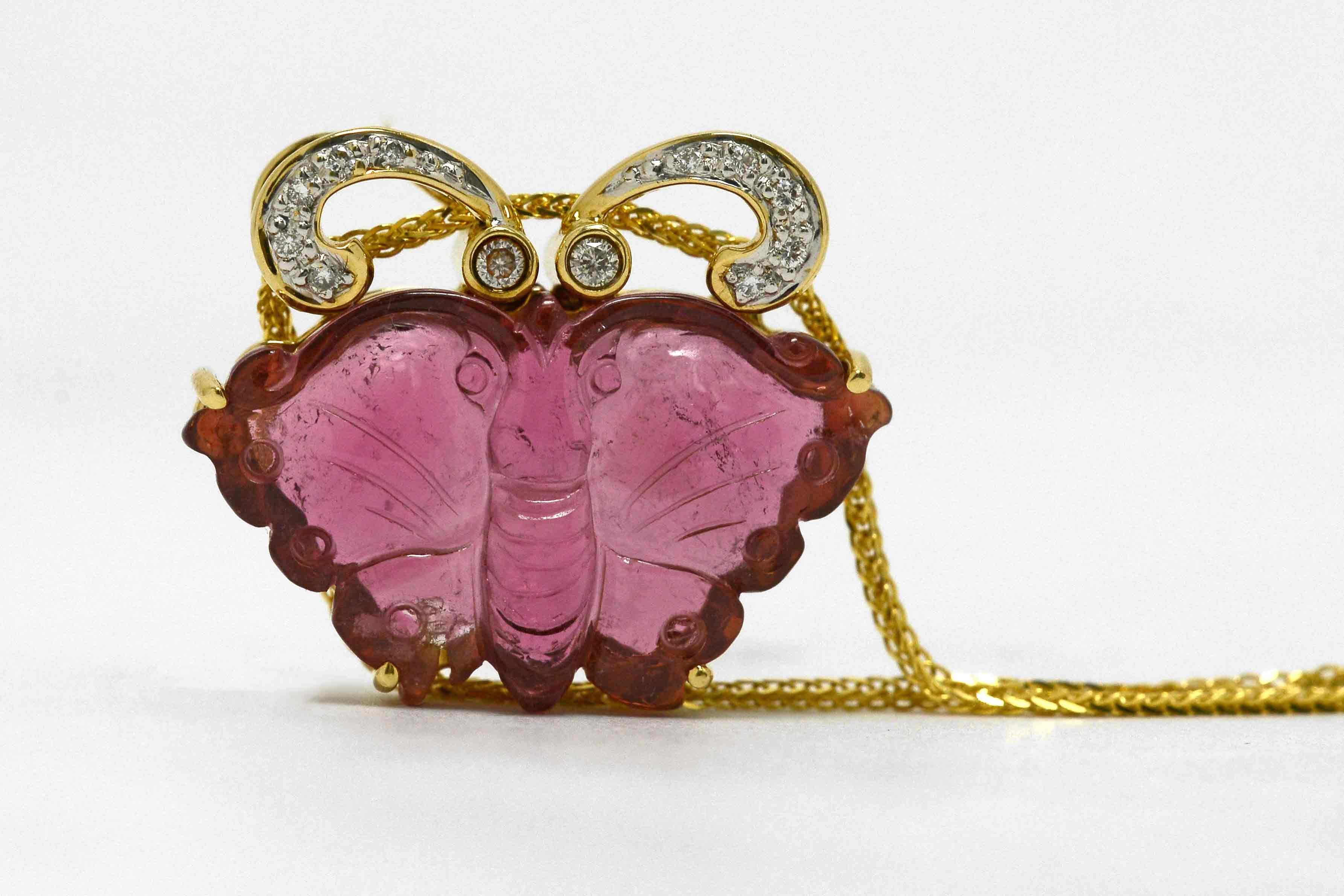 The Nogales Butterfly Necklace. Butterflies represent transformation, a very powerful theme. Here rendered in a beautifully hand carved rubellite tourmaline gemstone with diamond kissed antennae as a most alluring necklace. Naturalist forms came to