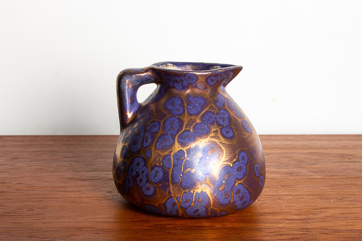 Superb Art Nouveau vase with floral motifs.
Léon Pointu (1879-1942) was a French ceramicist active in the early 20th century, known for his stoneware and earthenware pieces in the Art Nouveau style. He worked for a long time in Vallauris. His works