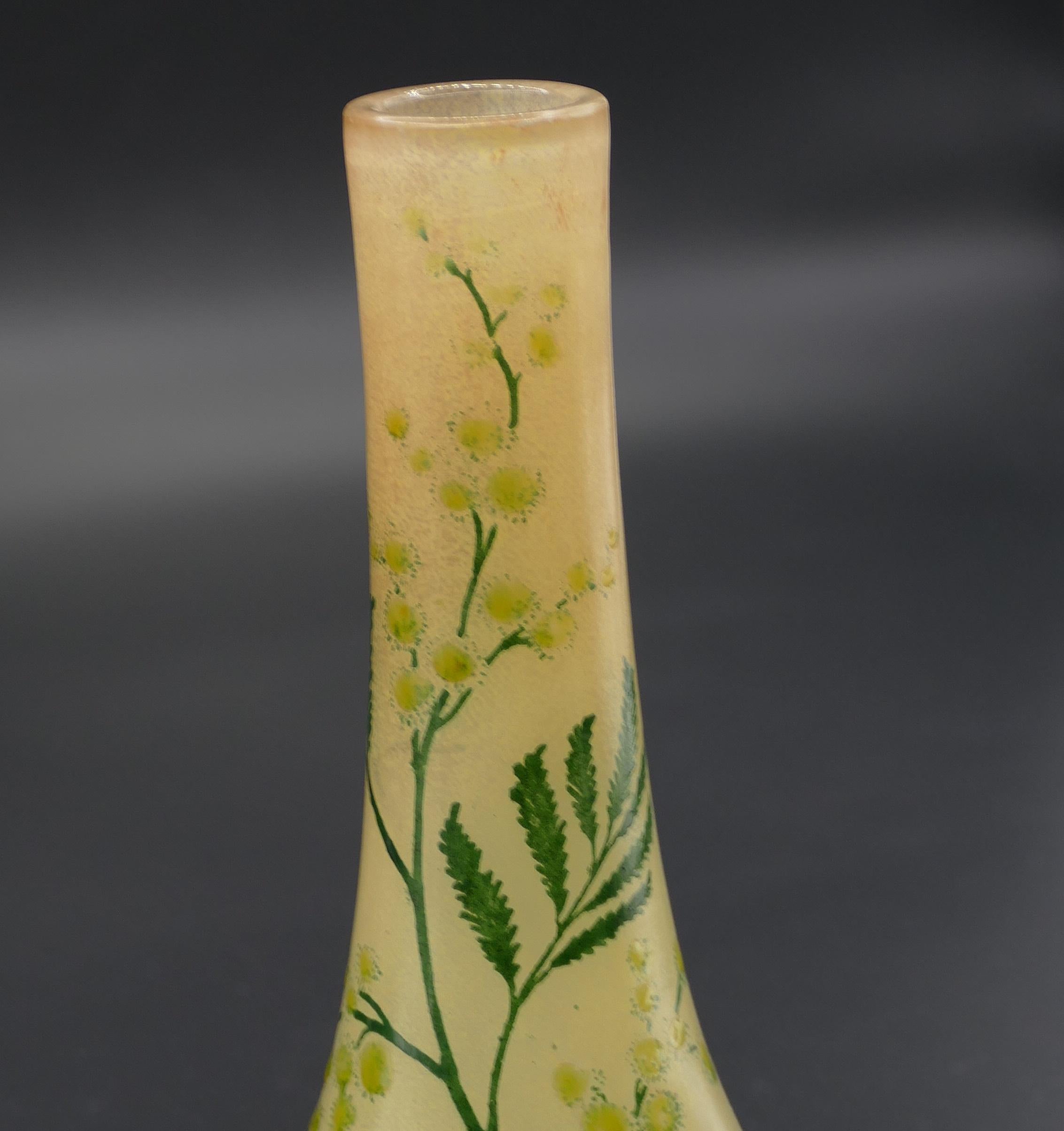 Art Nouveau vase with mimosa - France is an original decorative object realized in France between the 1900 and the 1914.

Realized by Legras & Cie, made in France. 

Original glass with handmade decorations. 

Mint conditions. 

Beautiful