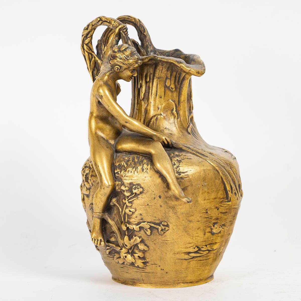Art Nouveau vase, jug, signed A, Vibert, circa 1900 .

Gilt bronze vase, jug, Art Nouveau style, 1900, signed A, Vibert.
h: 21cm, w: 17cm, d: 13cm