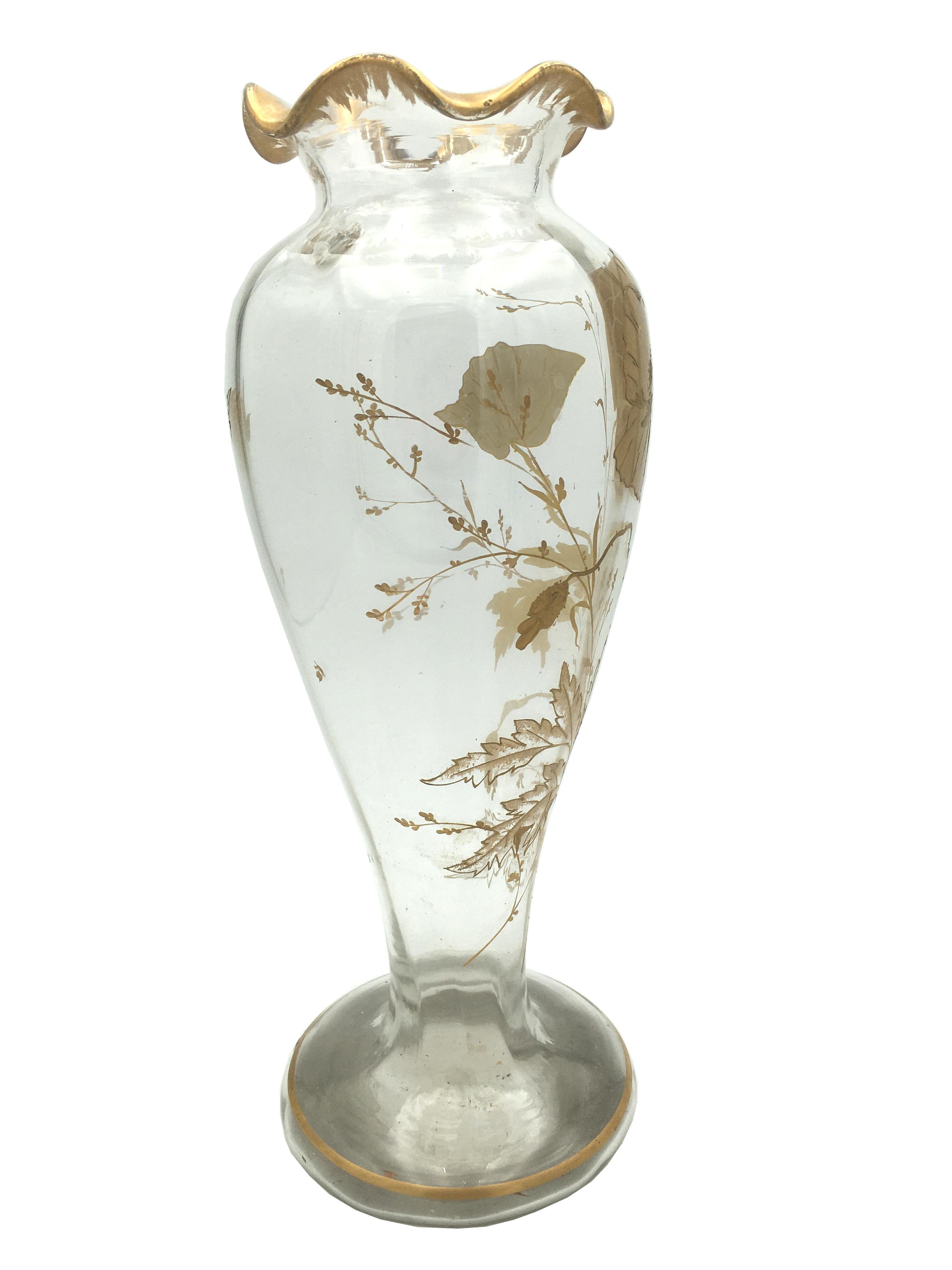 Superb Art Nouveau blown vase with gilt decoration of poppies and butterfly. Gilt mark at the bottom. age and use with some rubbing of the edge of the base. 
 France
 End of 19th or early 20th century.

   