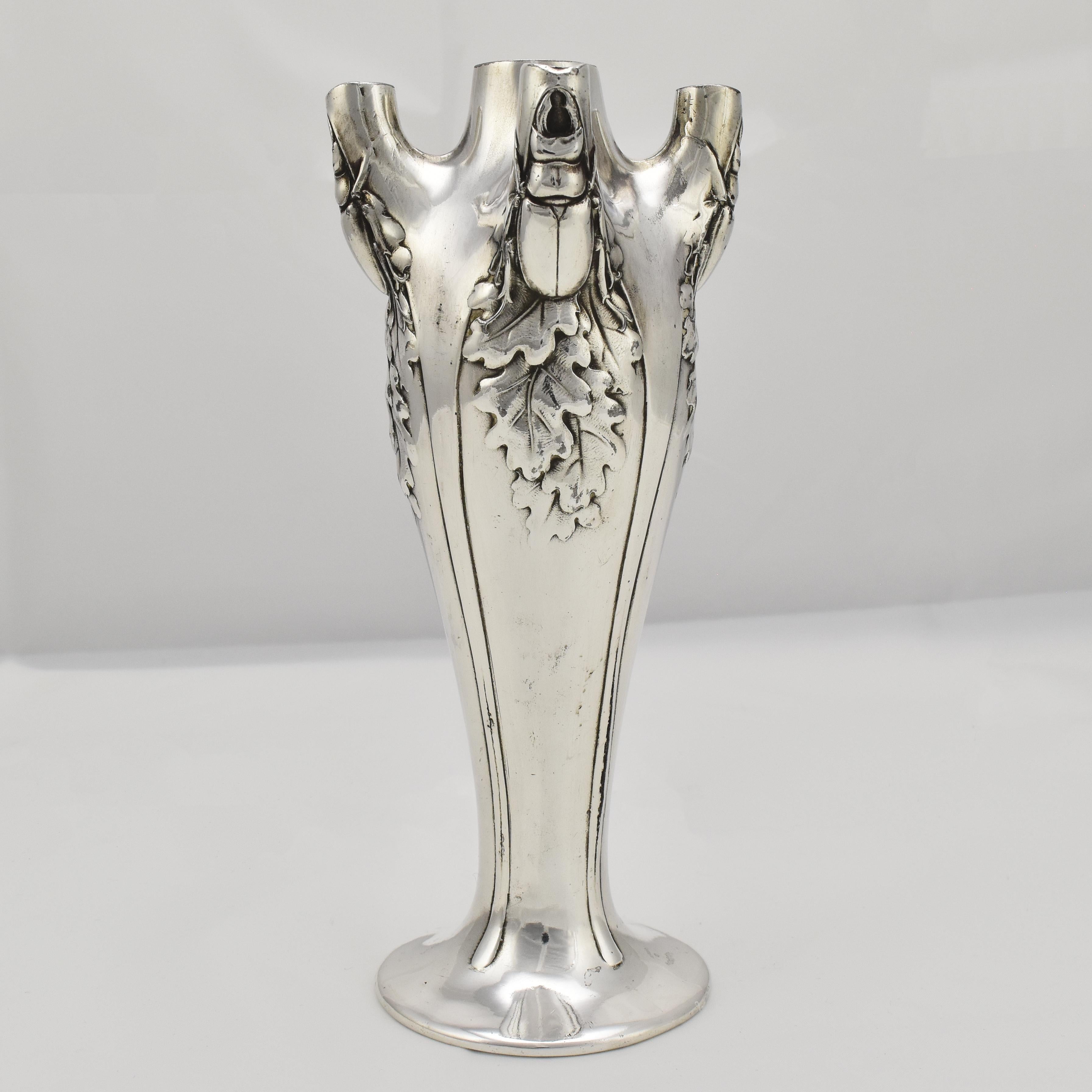 Antique decorative Christofle Gallia Art Nouveau vase with five stems decorated with stag beetles and oak leaves made from silverplated pewter. Marked on the bottom with the manufacturers mark and numbered 4842. 