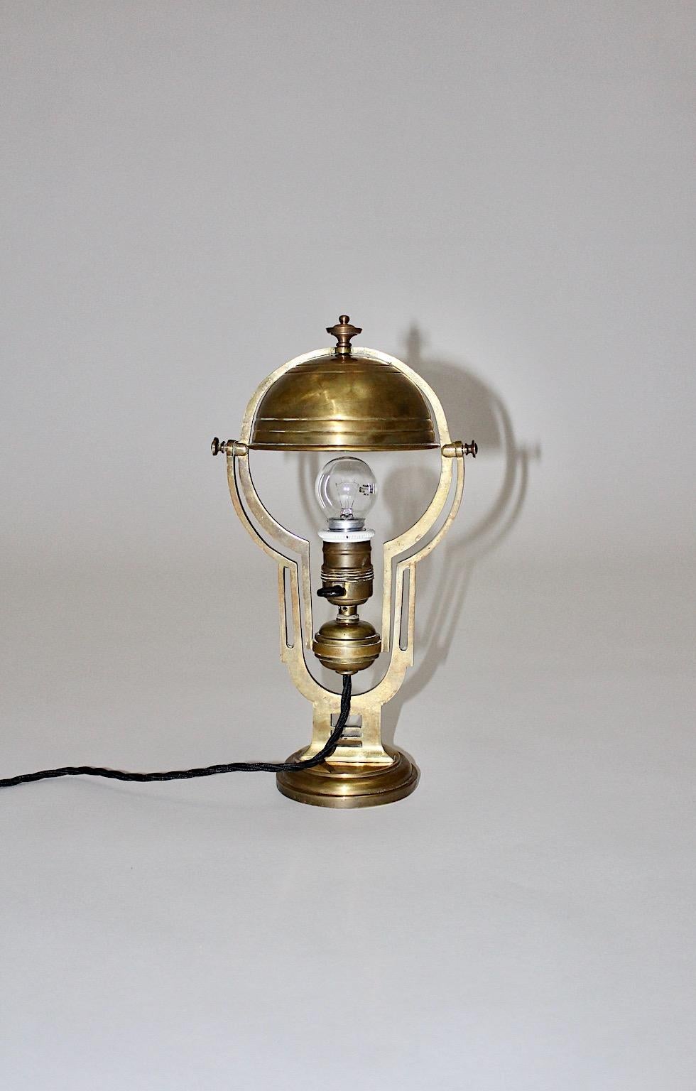An Art Nouveau vintage solid brass table lamp, which was designed and manufactured circa 1900 in Austria.
The table lamp shows an adjustable dome shade. While the table lamp is rewired it features an original switch at the E 27 socket.
Very good