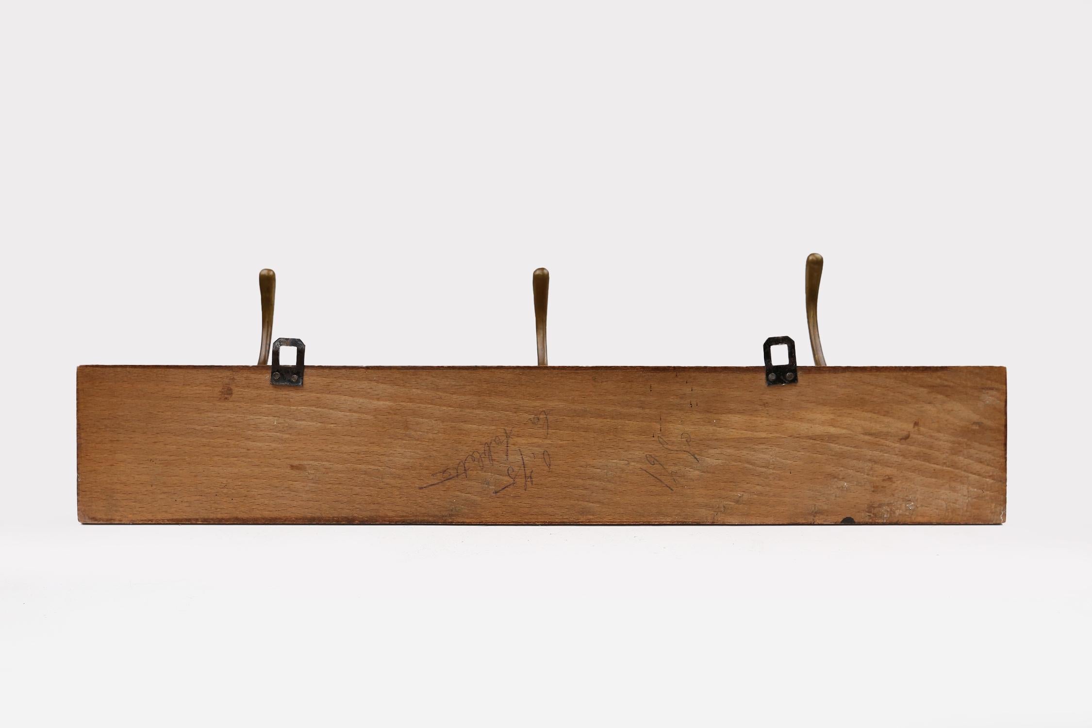 Art Nouveau wall coat rack in carved wood with brass, France ca. 1910 For Sale 3