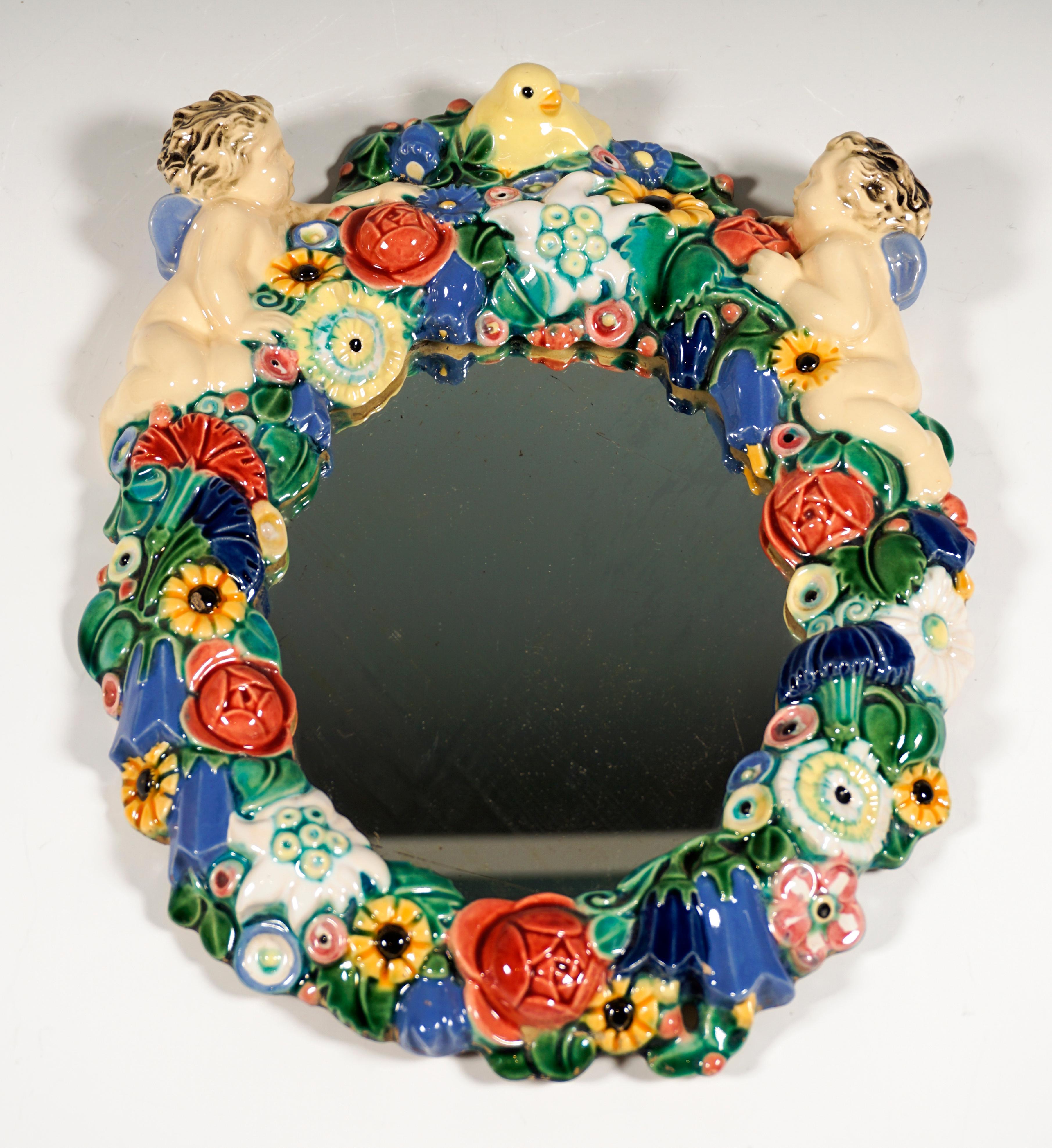 Austrian Art Nouveau Wall Mirror With Flowers And Cupids by Michael Powolny Vienna c 1913 For Sale