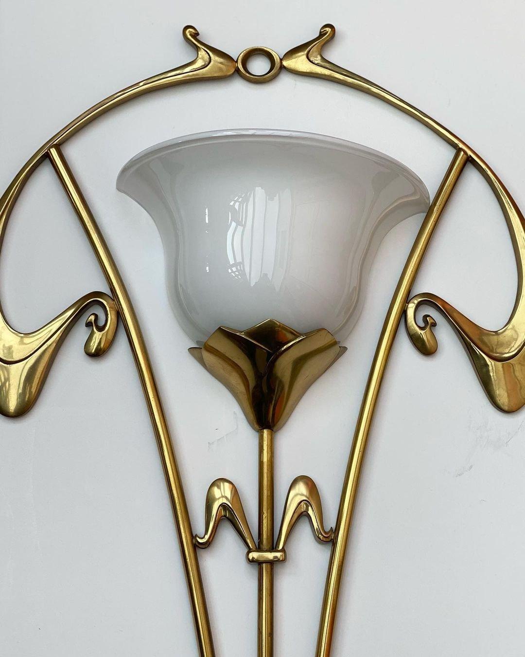 Delightful Art Nouveau style sconce.

Stunning Italian Flush mount light made of full shiny brass frame with opaline glass diffuser. The light can be mounted as wall lamp. The brass has a fantastic shiny vintage patina.


Marvelous work of art as