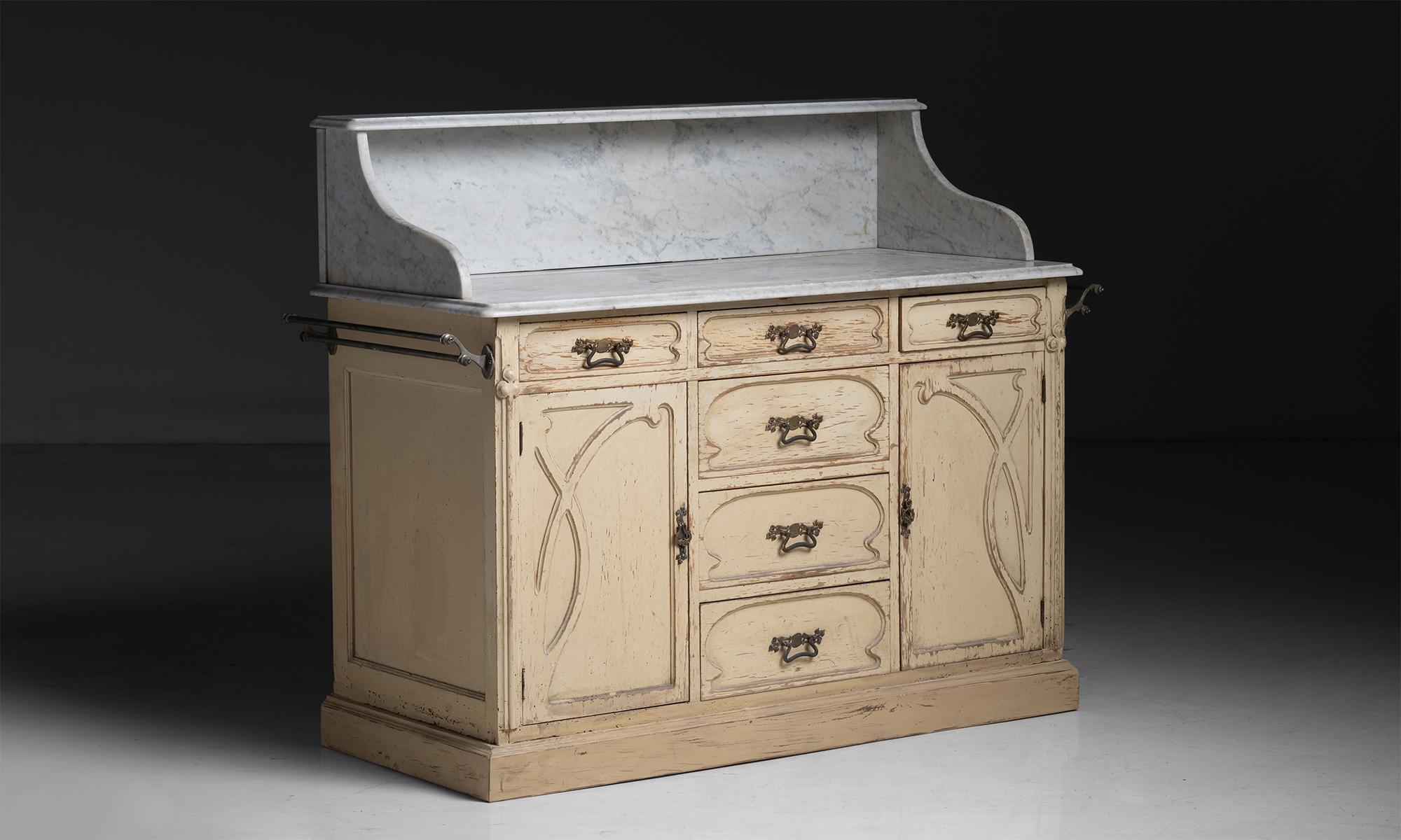Art Nouveau Wash Stand

England circa 1890

Marble top with decorative carving, original paint, and copper railing.

Measures 57.75”w x 24”d x 45.75”h x 33.5” surface height