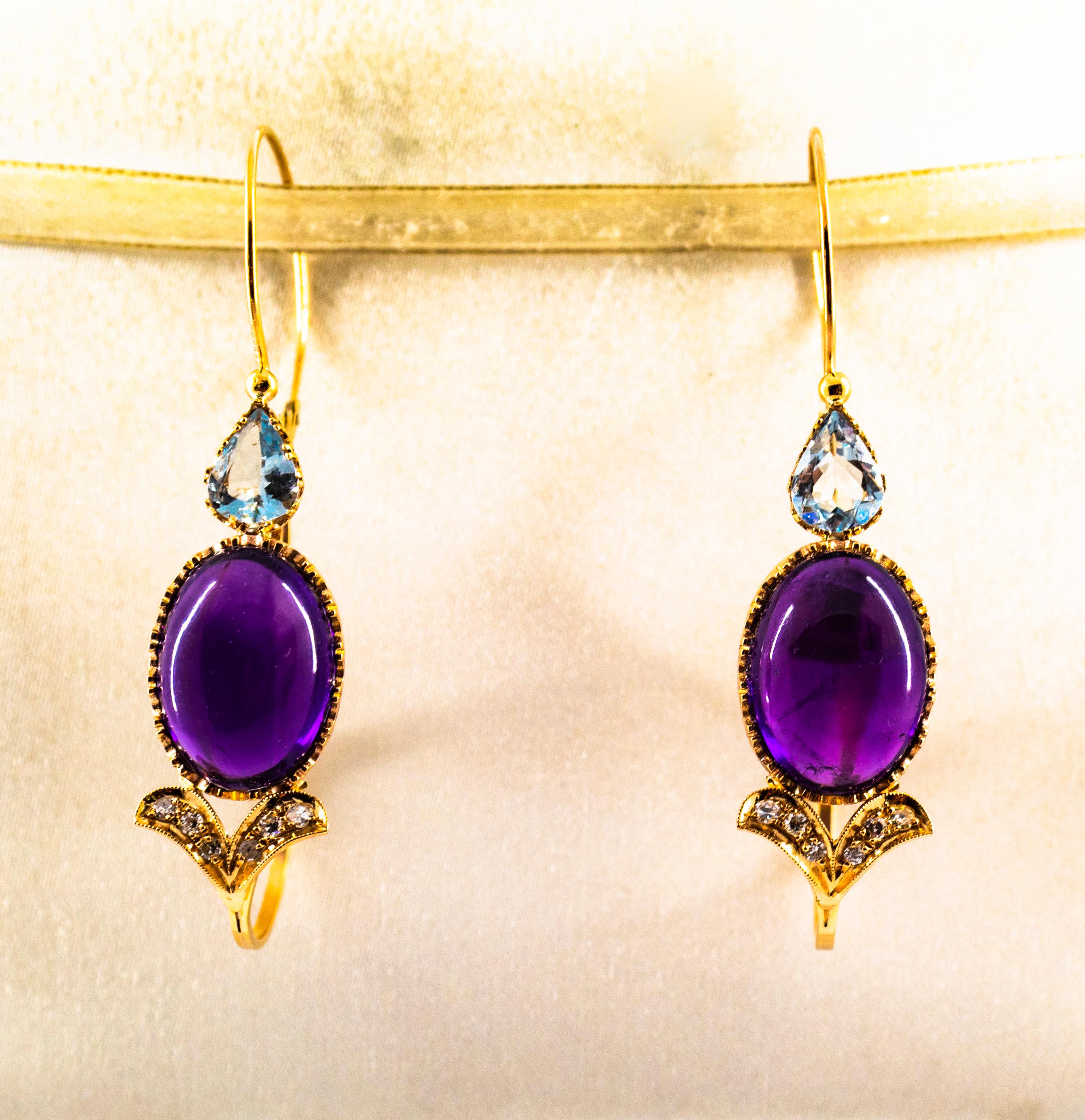 These Earrings are made of 9K Yellow Gold.
These Earrings have 0.30 Carats of White Modern Round Cut Diamonds.
These Earrings have 2.80 Carats of Aquamarines.
These Earrings have 12.25 Carats of Cabochon Cut Amethysts.
These Earrings are inspired by