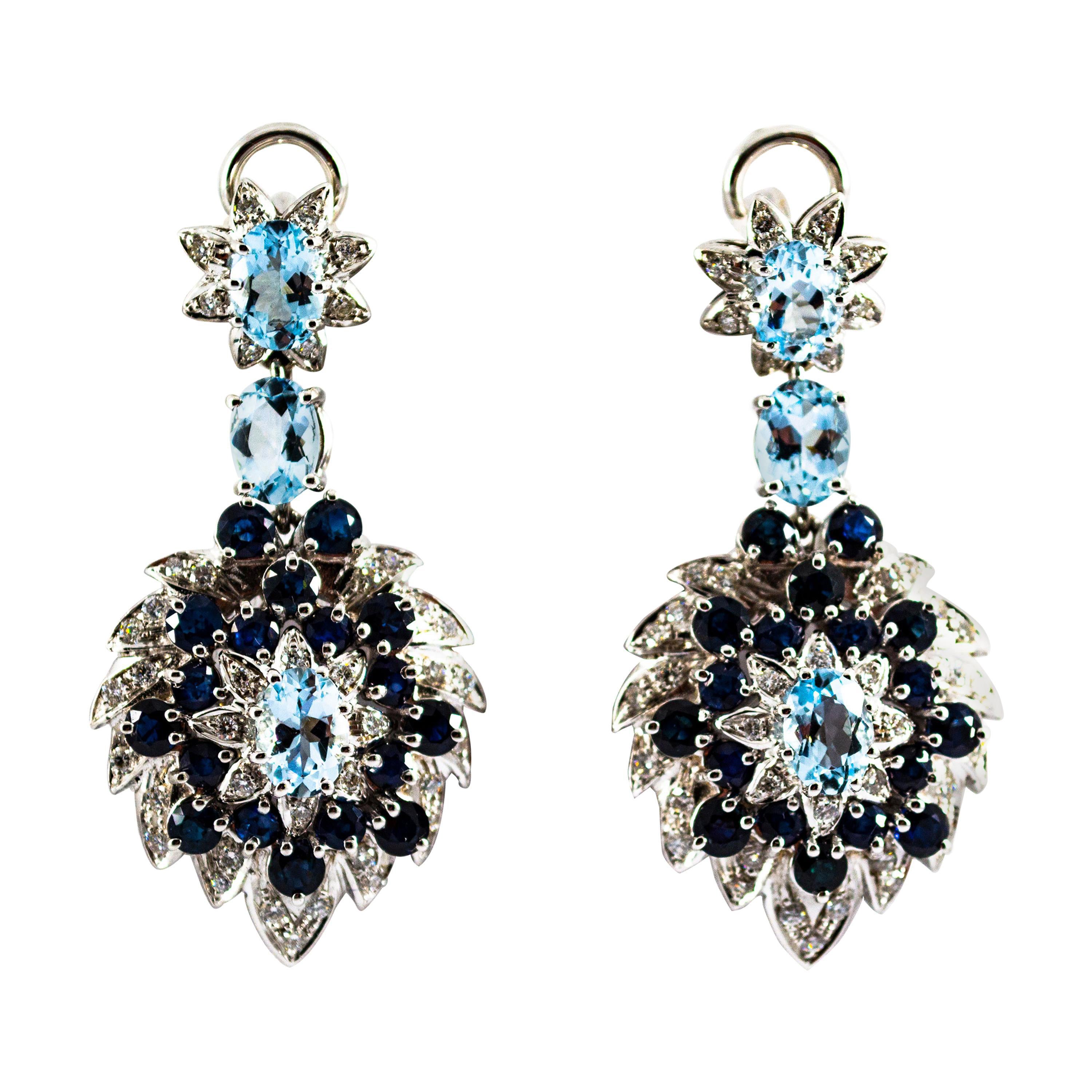 Orecchini a clip in oro bianco con diamanti bianchi, zaffiri blu e acquamarine in vendita