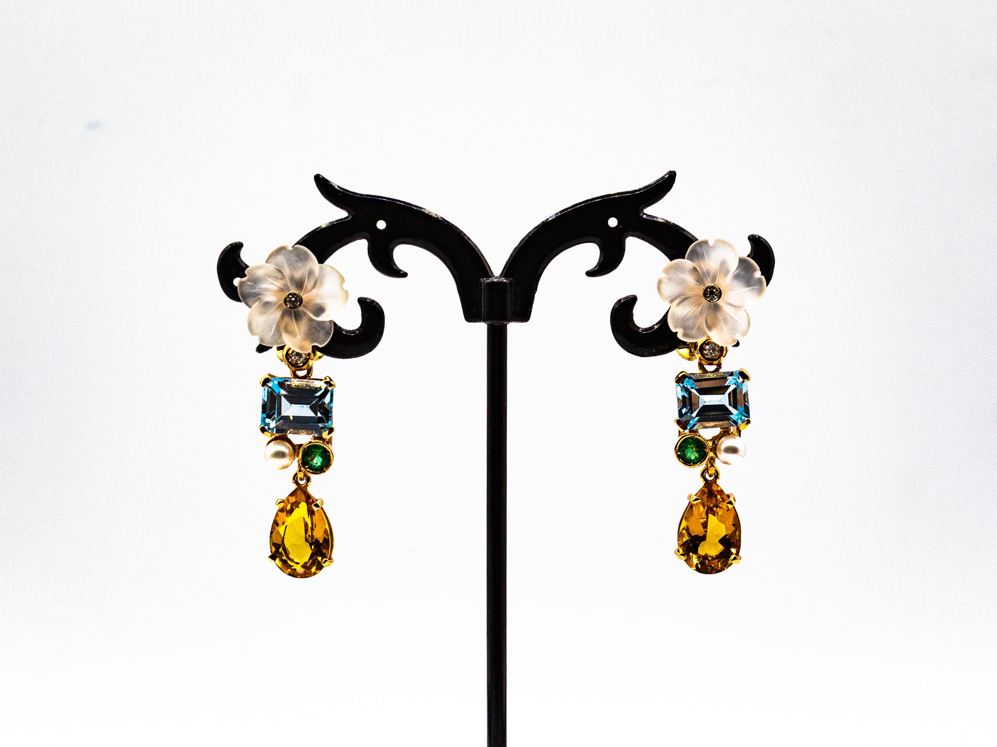 These Earrings are made of 14K Yellow Gold.
These Earrings have 0.10 Carats of White Brilliant Cut Diamonds.
These Earrings have 0.40 Carats of Emeralds.
These Earrings have also Pearls, Rock Crystal, Blue Topaz and Citrine.

These Earrings have