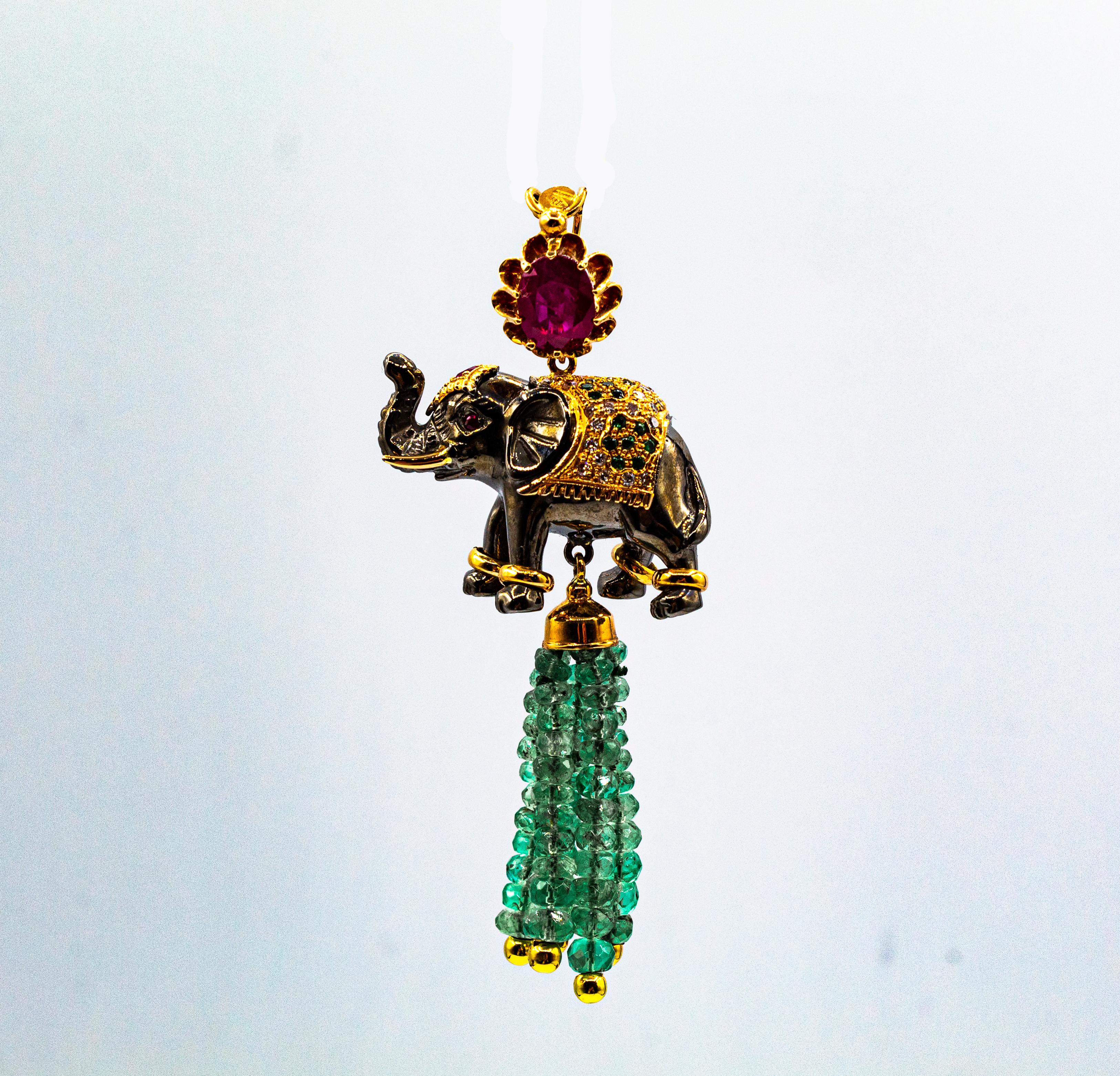 This Elephant Pendant is made of 14K Yellow Gold and Sterling Silver.
This Pendant has 0.35 Carats of White Brilliant Cut Diamonds.
This Pendant has 19.90 Carats of Emeralds.
This Pendant has 3.10 Carats of Rubies.
This Pendant has 0.30 Carats of
