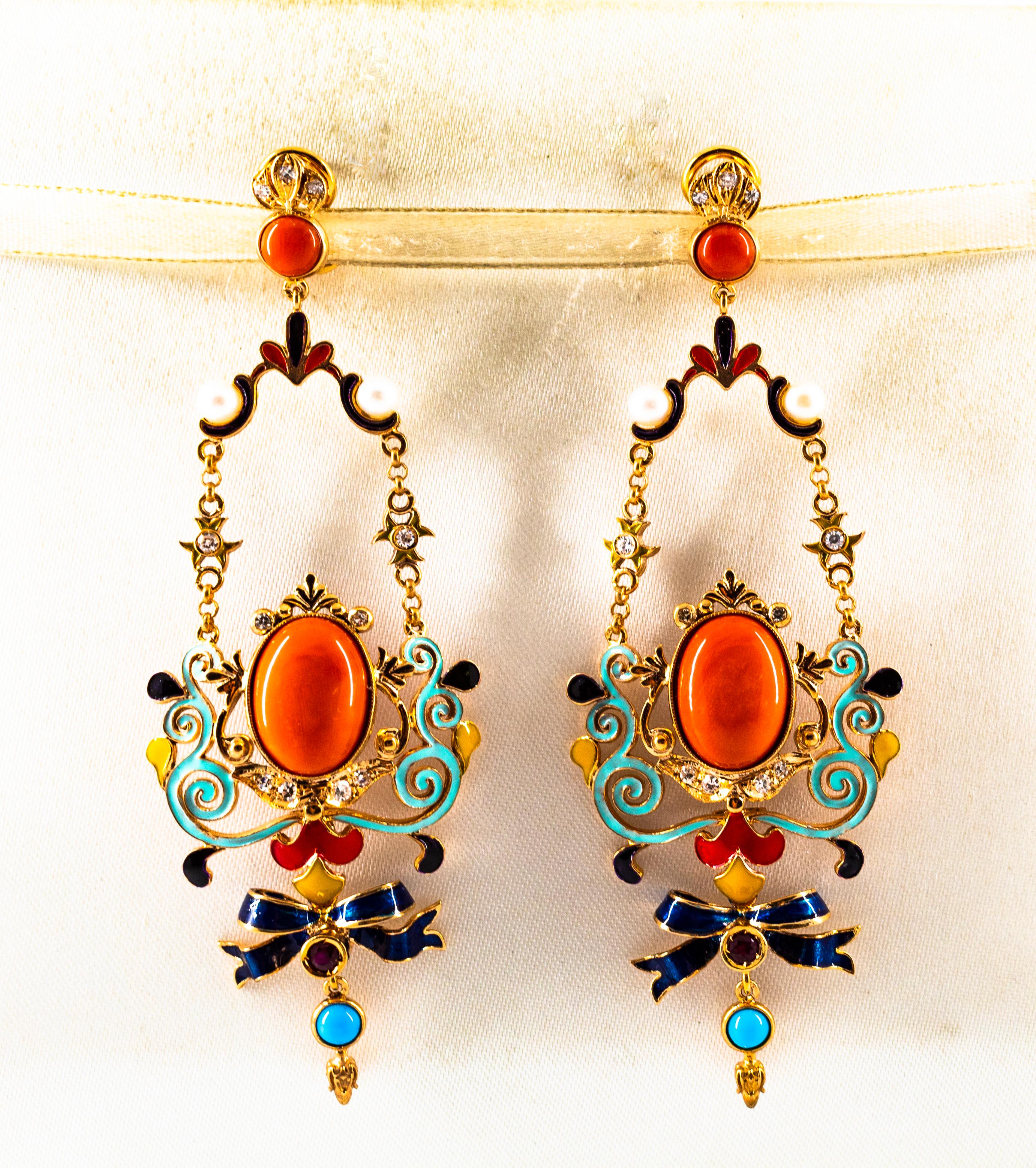 These Earrings are made of 9K Yellow Gold.
These Earrings have  0.30 Carats of White Modern Round Cut Diamonds.
These Earrings have 0.20 Carats of Rubies.
These Earrings have Mediterranean (Sardinia, Italy) Red Coral and Turquoise.
These Earrings