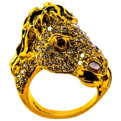 Art Nouveau White Diamond Ruby Enamel Yellow Gold Cocktail Gucci "Horse" Ring