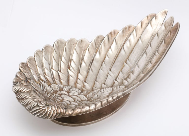 Unusual, Art Nouveau sterling silver, lightly gilt platter in the form of a bird's wing, Whiting Mfg. Company, Providence, Rhode Island, circa 1900. Platter has a low pedestal base. Excellent detail. Measures 10 1/4 inches wide x 5 inches deep (at