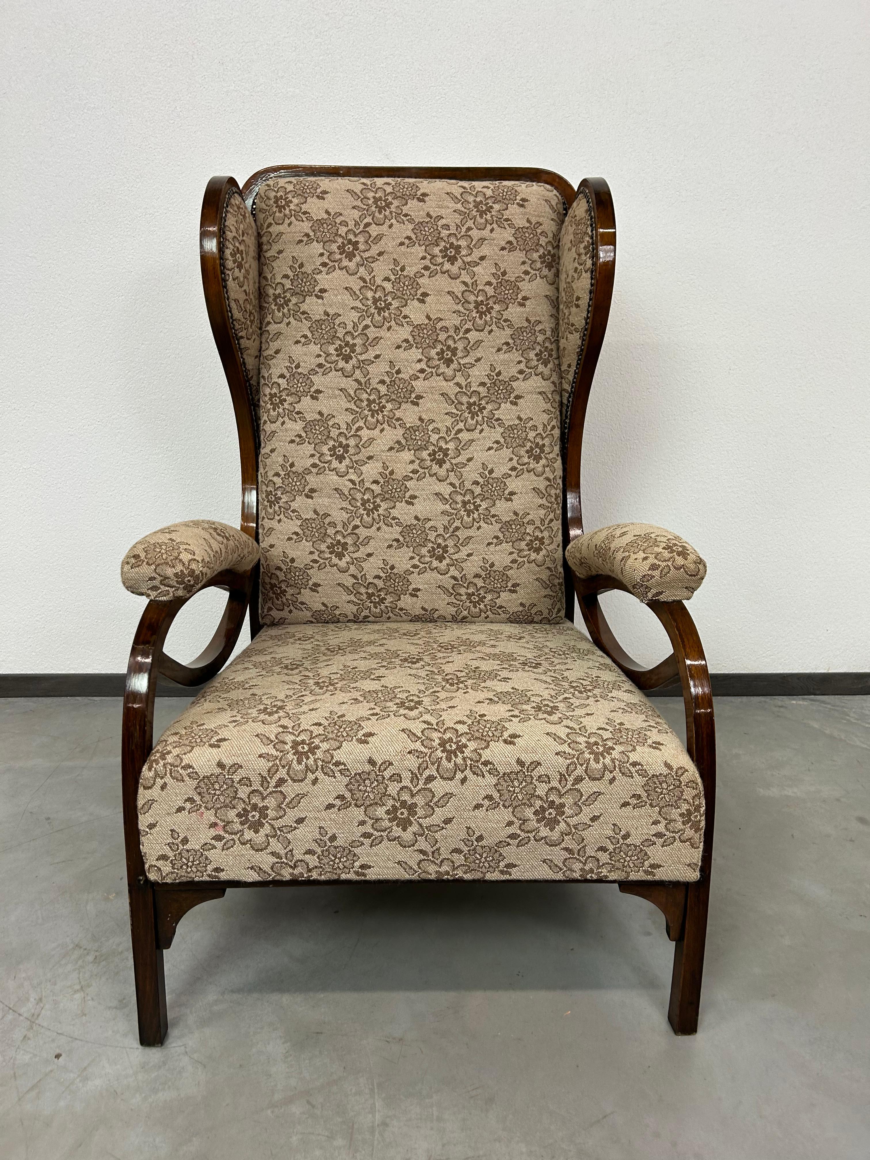Art nouveau wingchair no.6542 by Thonet in original vintage condition with signs of use.