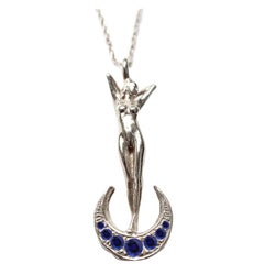 Art Nouveau Woman and Crescent Moon White Gold and Blue Sapphire Necklace
