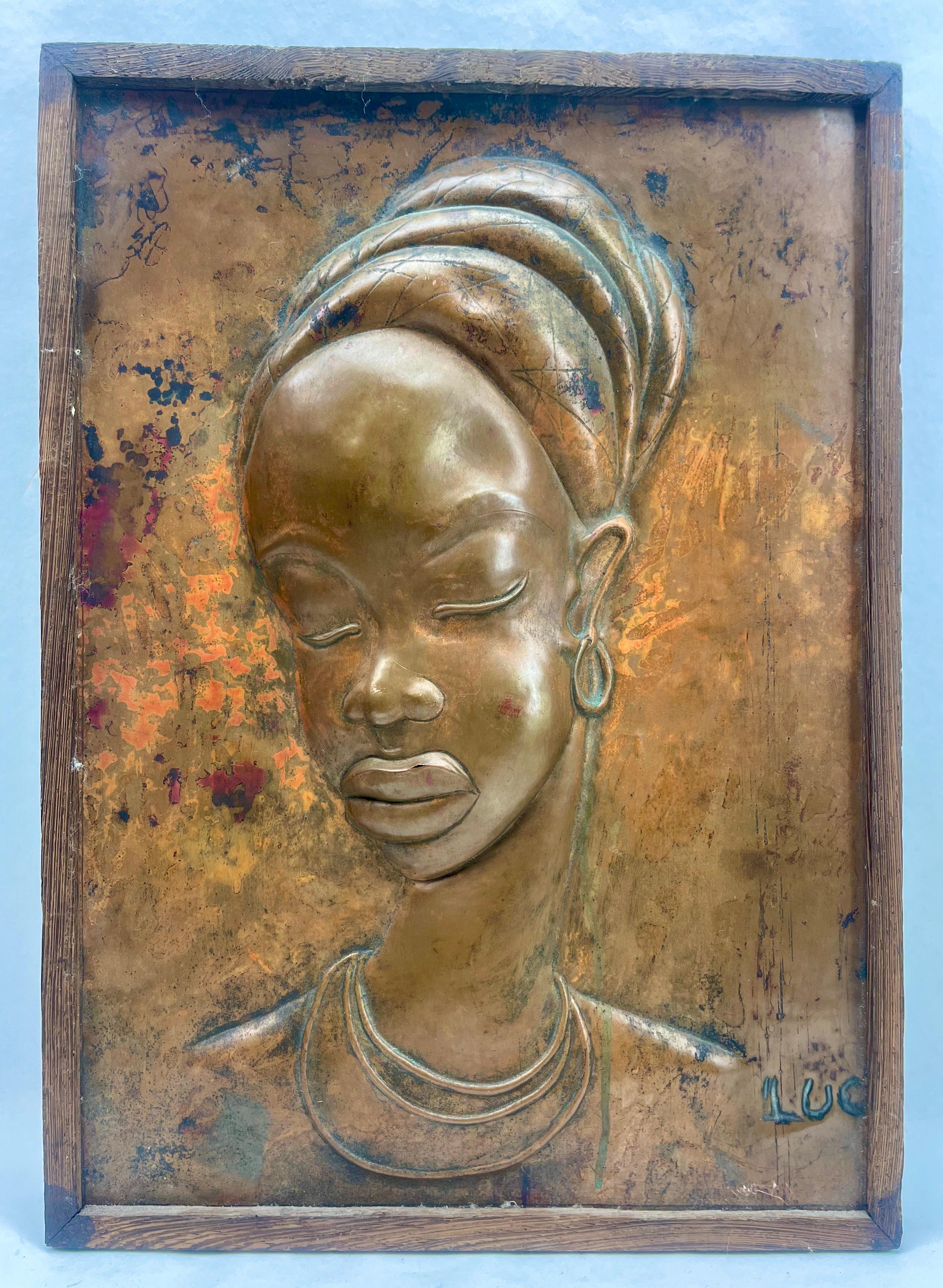 Art Nouveau Women's bust Copper Wall Plaque Wood  Framed Signed Luc

The piece is in Good condition and a real beauty!

Please don't hesitate to get in touch with any further questions.  
With Best Wishes 
Geert






 