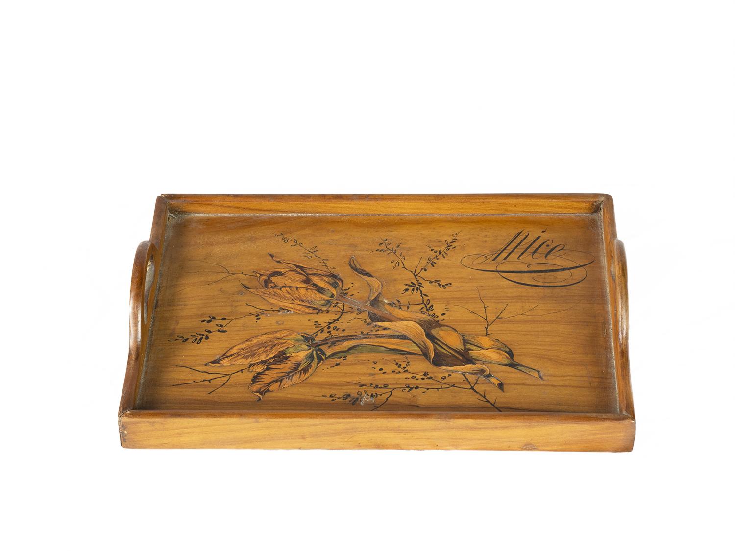 A small rectangular tray with raised edges, flower inlaid marquetry.
”Nice’ marked.