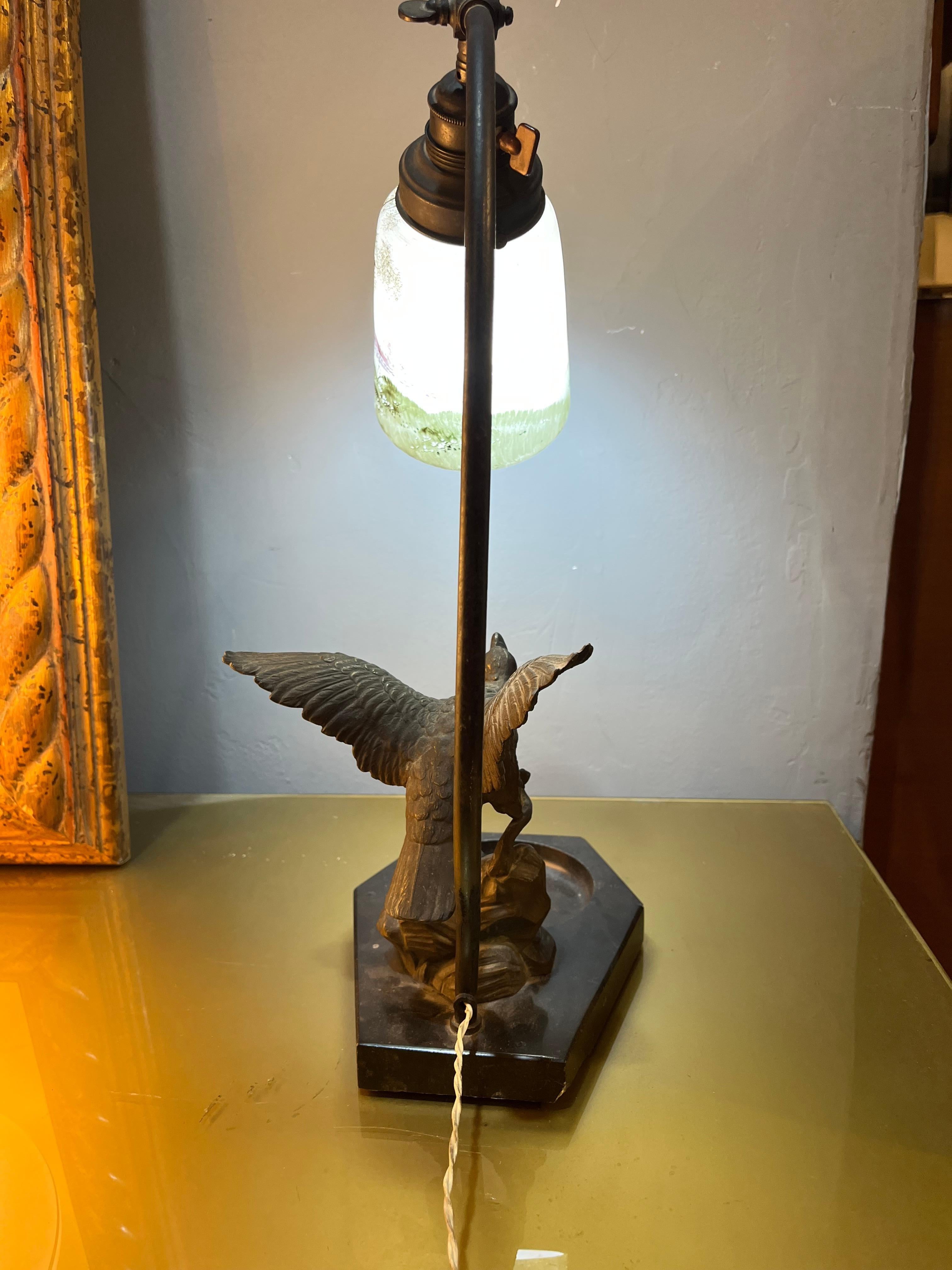 Mid-20th Century art nouveu lamp with eagle as base For Sale