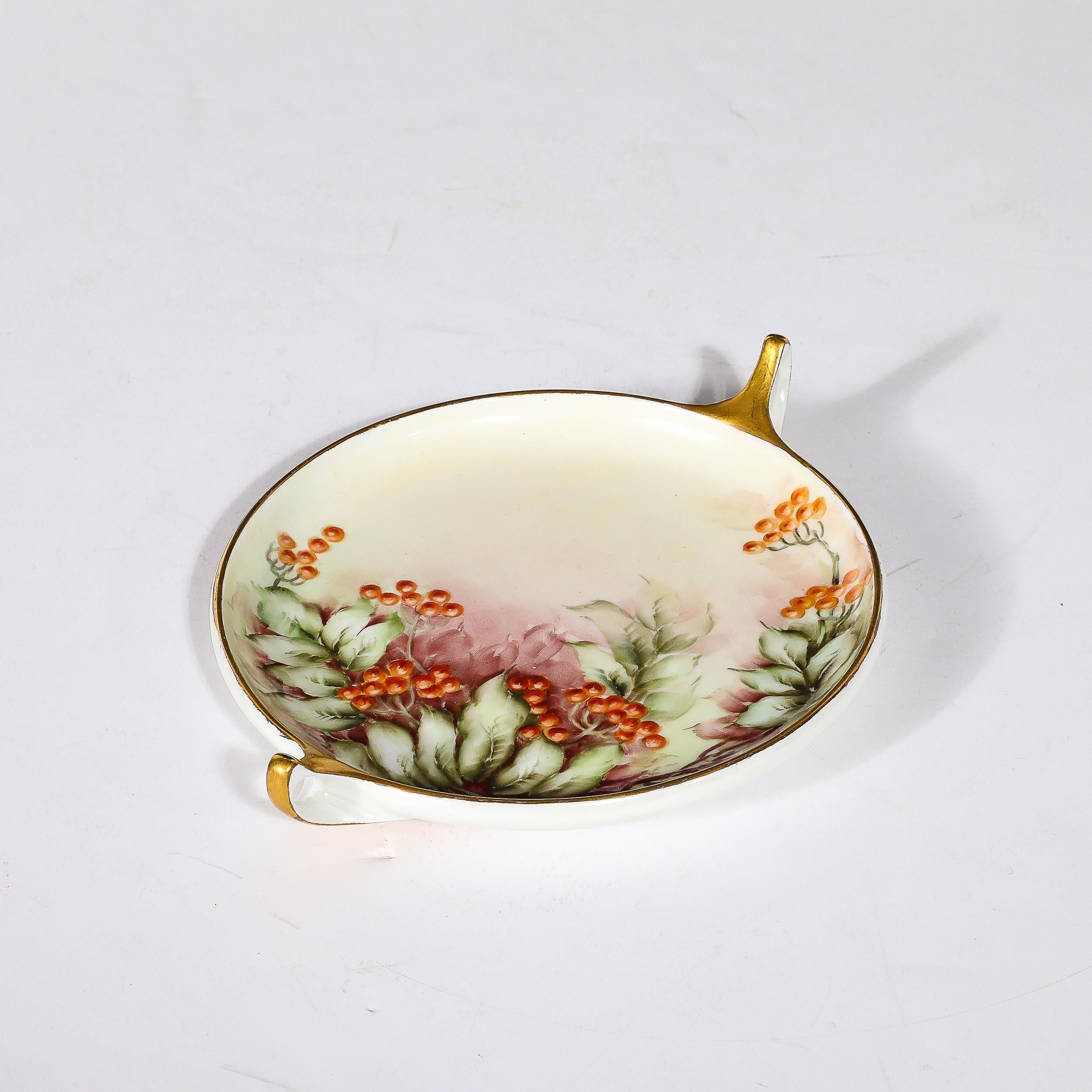 This beautiful Art Nouveau  Porcelain Dish W/Gilt Handles & Natural Motif in the Donatello Pattern is by the esteemed manufacturer Rosenthal and originates from Germany, Circa 1912. Features a beautiful rounded form and stylized gilt handles and