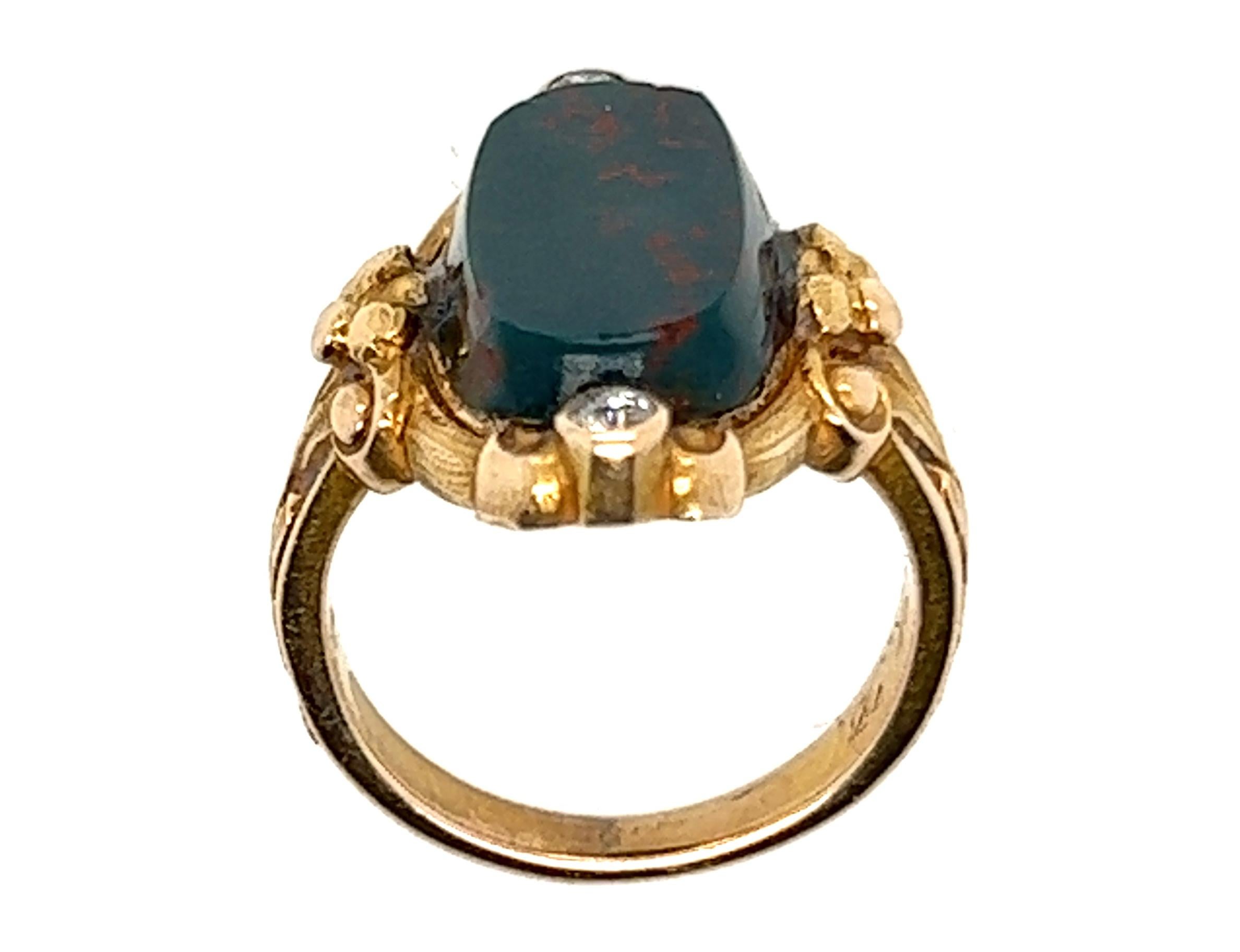 Genuine Original Art Noveau Antique from 1914 Bloodstone Diamond Ring Hand Engraved Flowers 14K Yellow Gold


Features a 14.9 x 8mm Genuine Natural Oval Bloodstone Gemstone

Defines Art Noveau

Hand Engraved Flowers

Genuine Old Mine Cut Diamonds