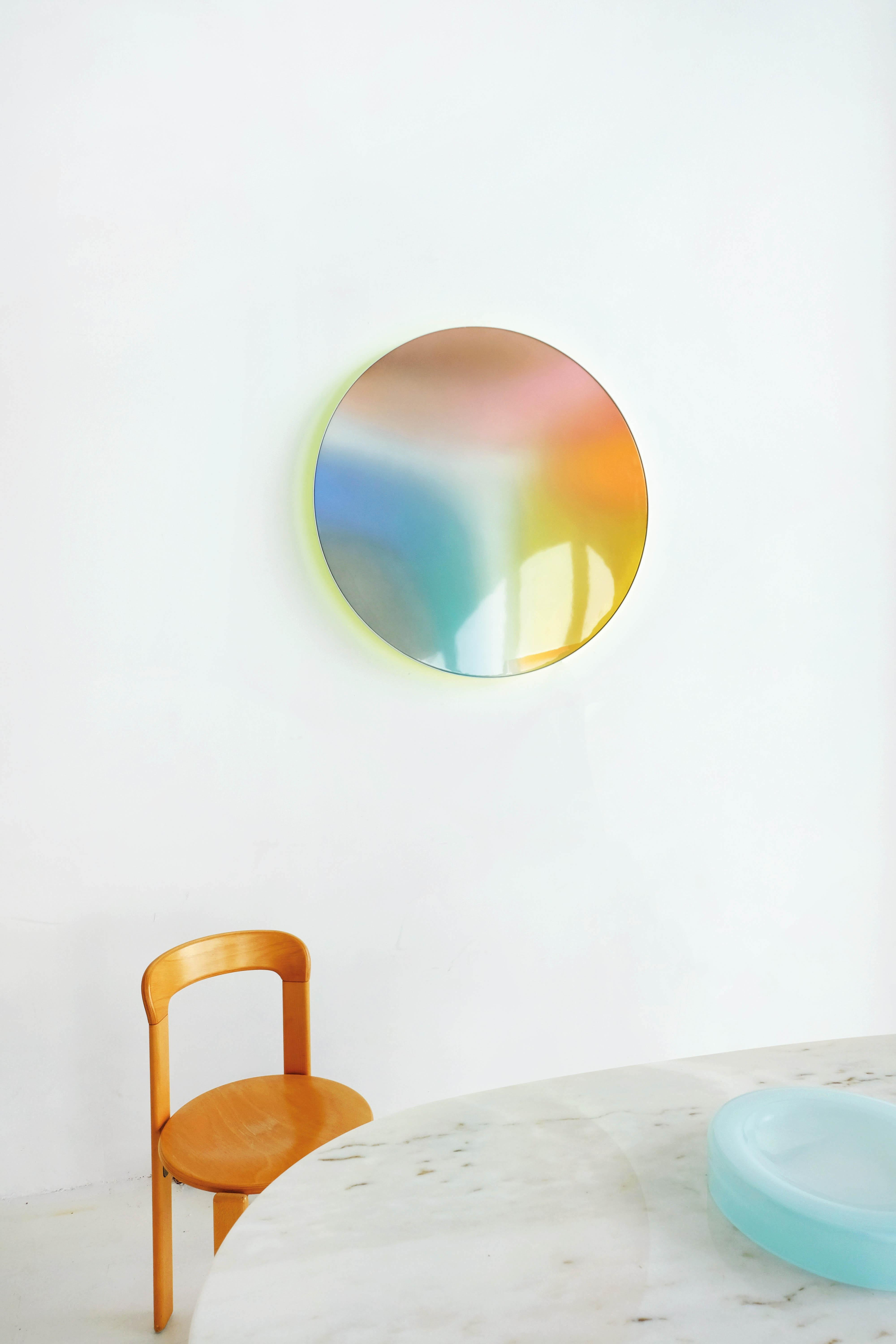This particular piece evokes the radiant warmth en energy of the sun. ’FEY’ seamlessly transitions from being an art object during the day to a mesmerizing light installation at night.  It's entirely painted by hand in my Amsterdam atelier and three