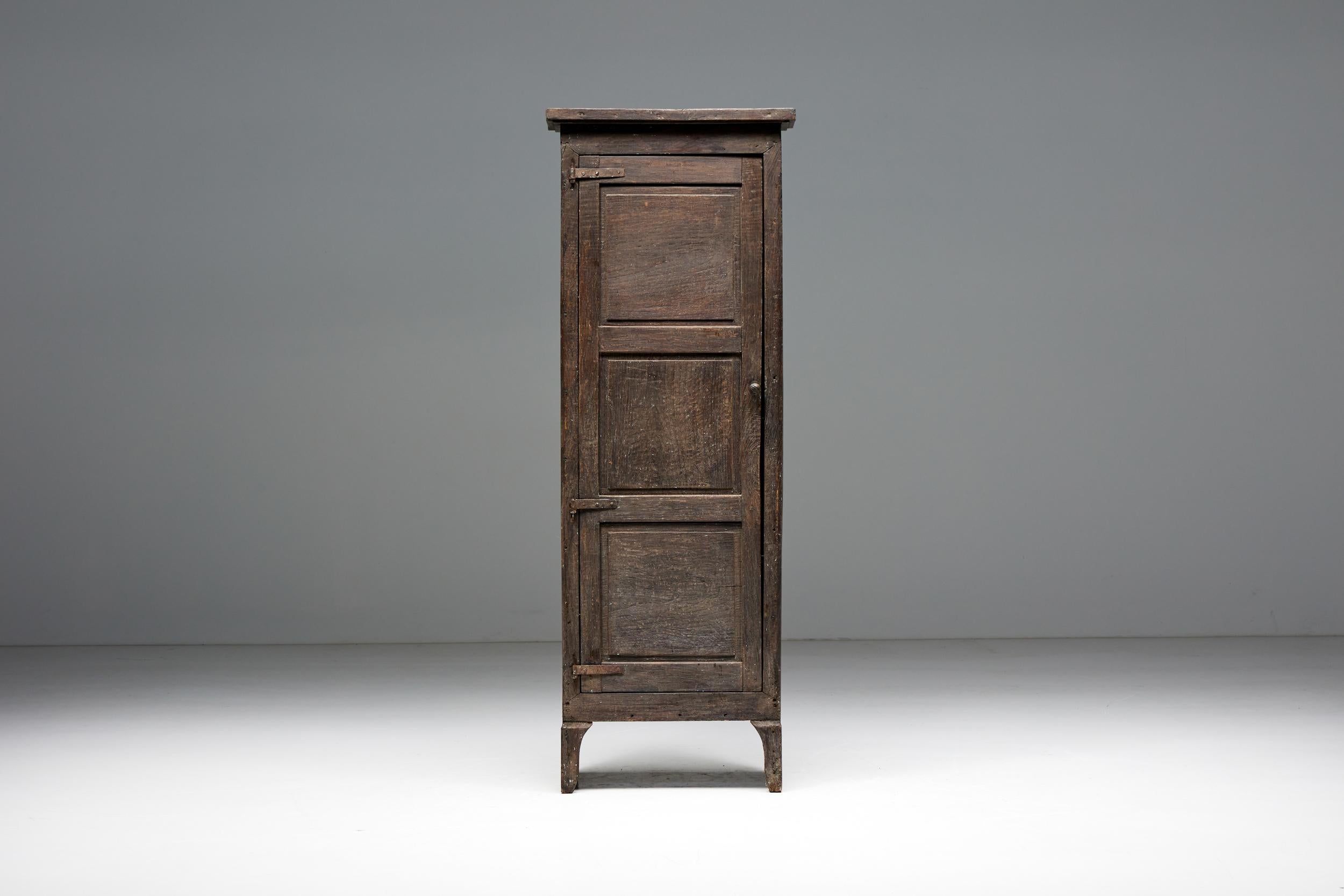 Monoxylite; Art Populaire; Travail Populaire; Folk Art; Wabi Sabi; 19th Century; France; Cupboard; Cabinet; Rustic; Artisan; Craftsmanship;

Travail populaire one-door cupboard, a stunning example of skilled craftsmanship. Meticulously handcrafted