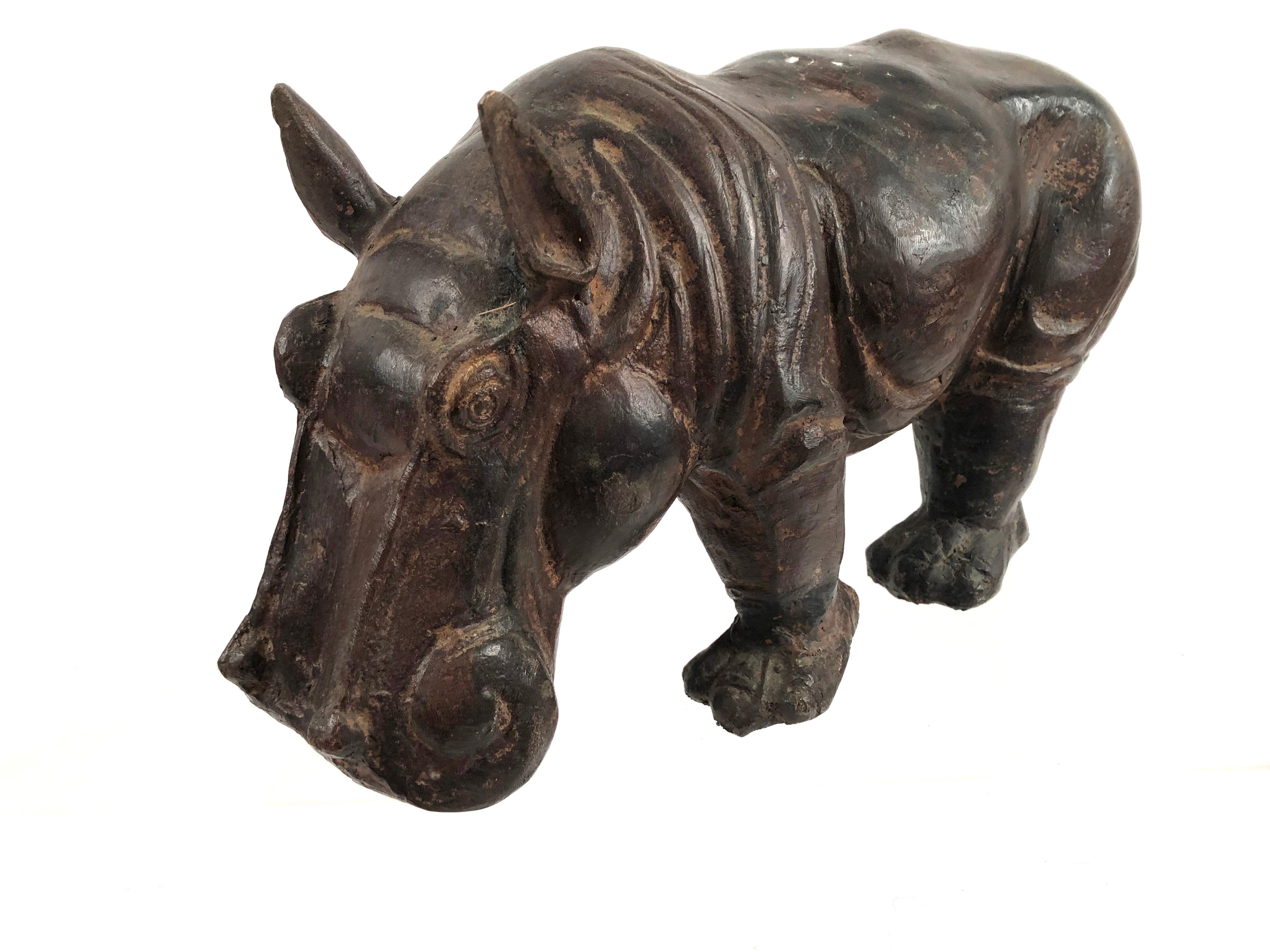 An unusual and robustly modelled art pottery figure of a hippopotamus in brown glazed stoneware, circa 1960s-1970s.
