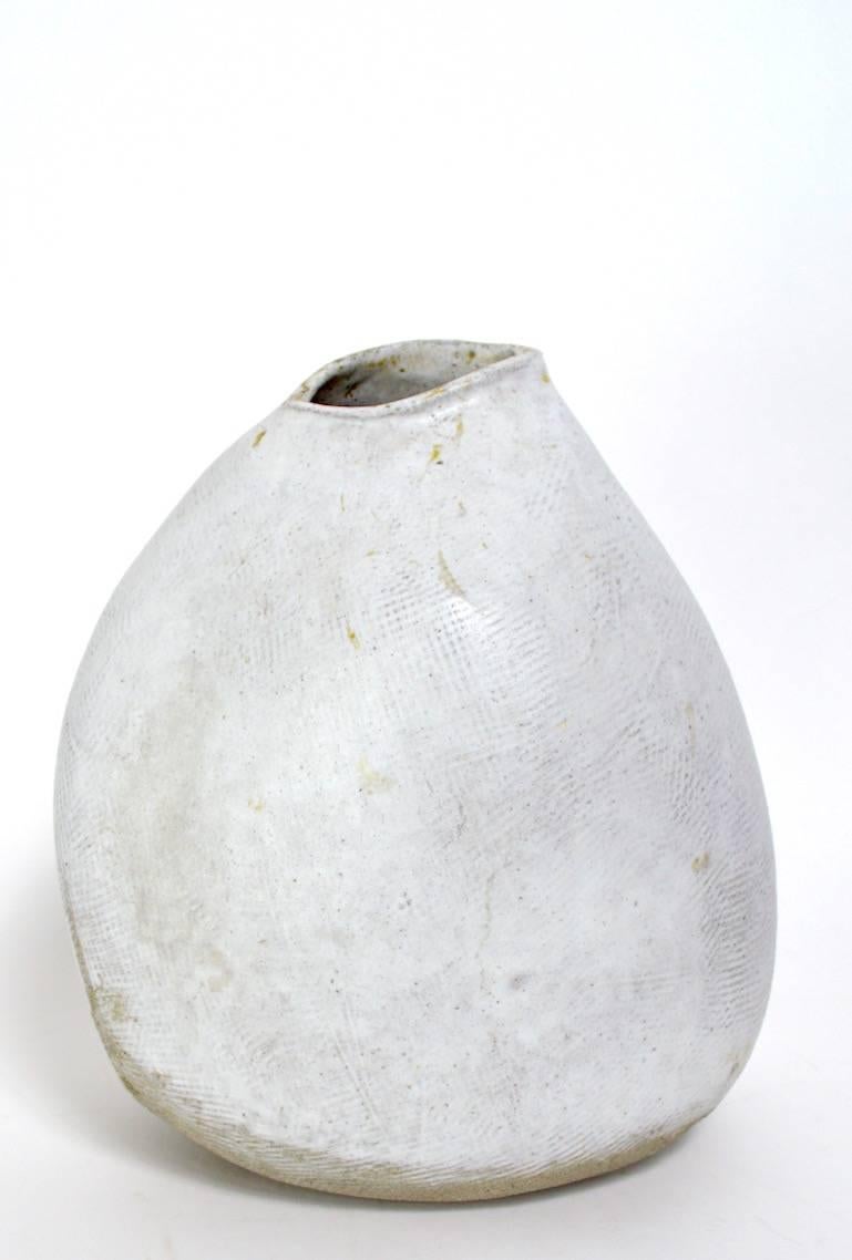 Wonderful free-form vase by noted potter Frances Simches. Organic form with signature subtile glaze. This example is free of damage, unsigned.