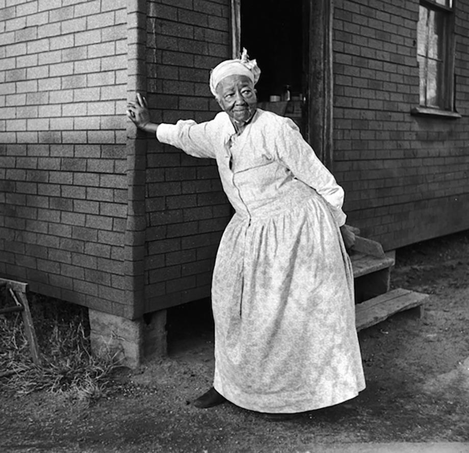 Art Shay Black and White Photograph - A Farm Grandma Waiting for Kids, 1951