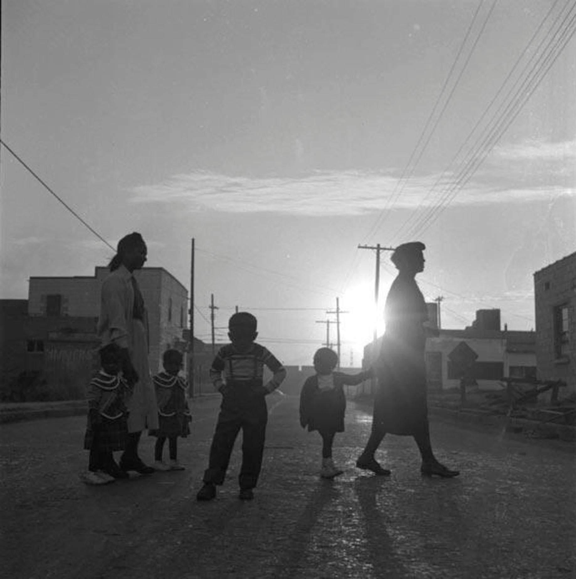 Art Shay Black and White Photograph - Lovejoy AKA Brooklyn, Illinois, Sunday Morning Walk for Ebony Magazine, 1952