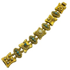 pulsera de diseño ART firmada vintage en tono dorado con perlas de imitación turquesa