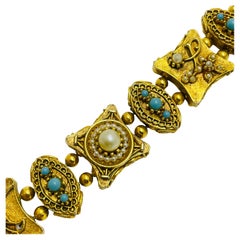 pulsera de diseño ART firmada vintage en tono dorado con perlas de imitación turquesa
