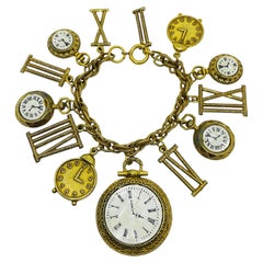 ART signed vintage gold tone watch charms chain designer bracelet