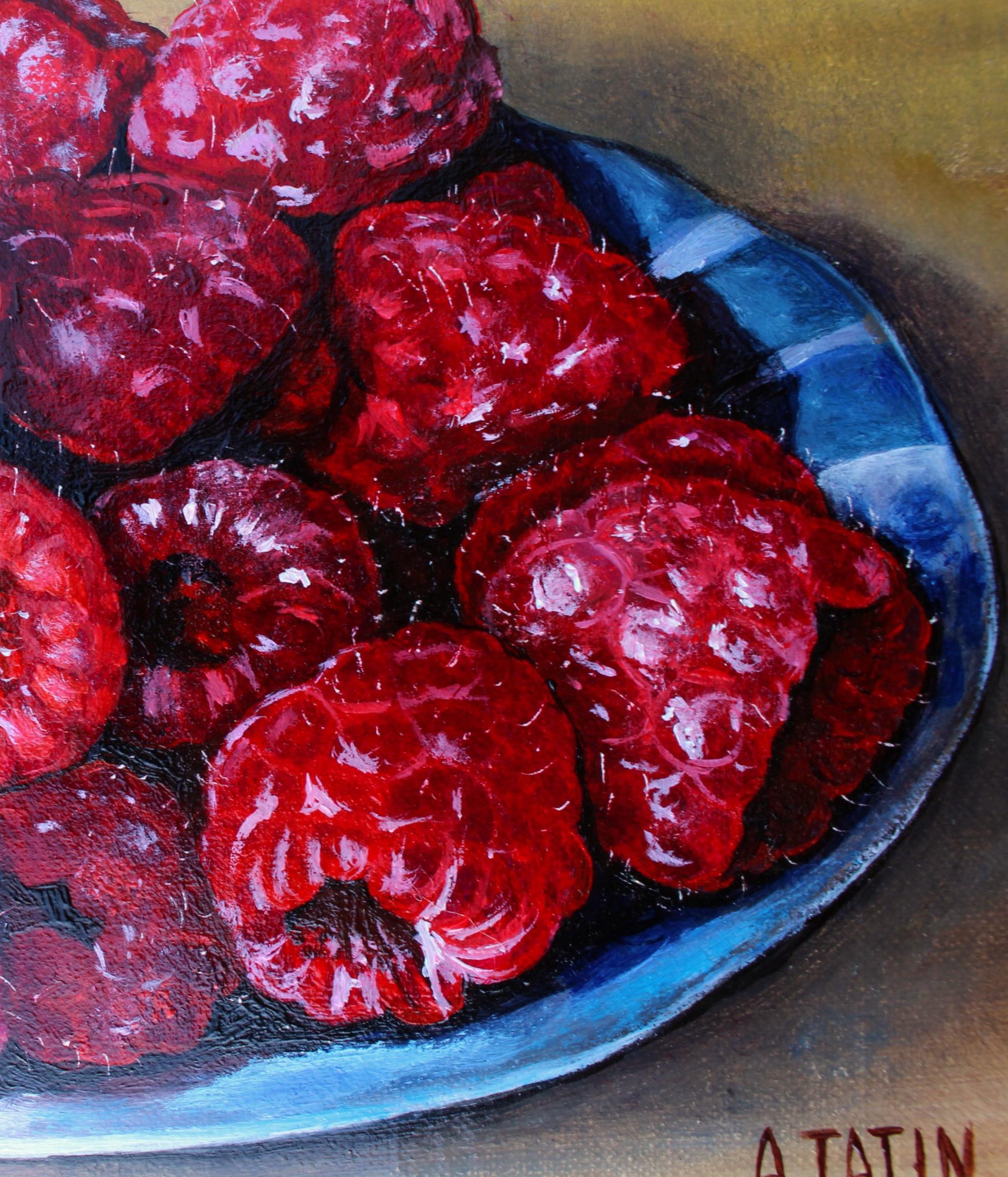 <p>Artist Comments<br>Fresh red raspberries glisten in a blue and white bowl. The play of light on the drupelets and the subtle shadows at the container's bottom enhances the realism of the artwork. Painted with Flemish techniques, the process