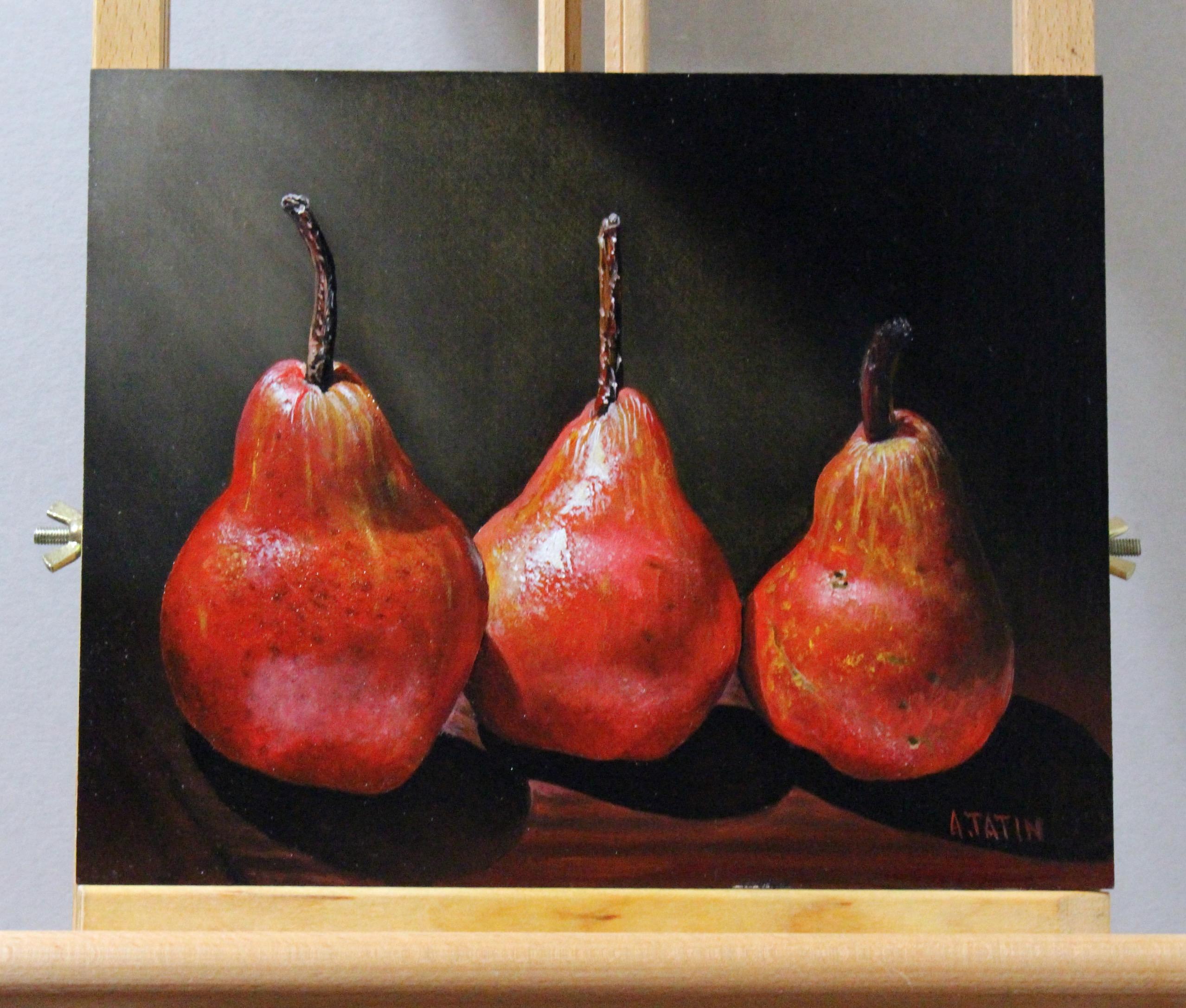 <p>Artist Comments<br>This still-life oil painting vividly portrays three overripe pears featuring wrinkled stems and noticeable discoloration on their skins. With the light shining on them, the fruits command attention and exude a profound beauty