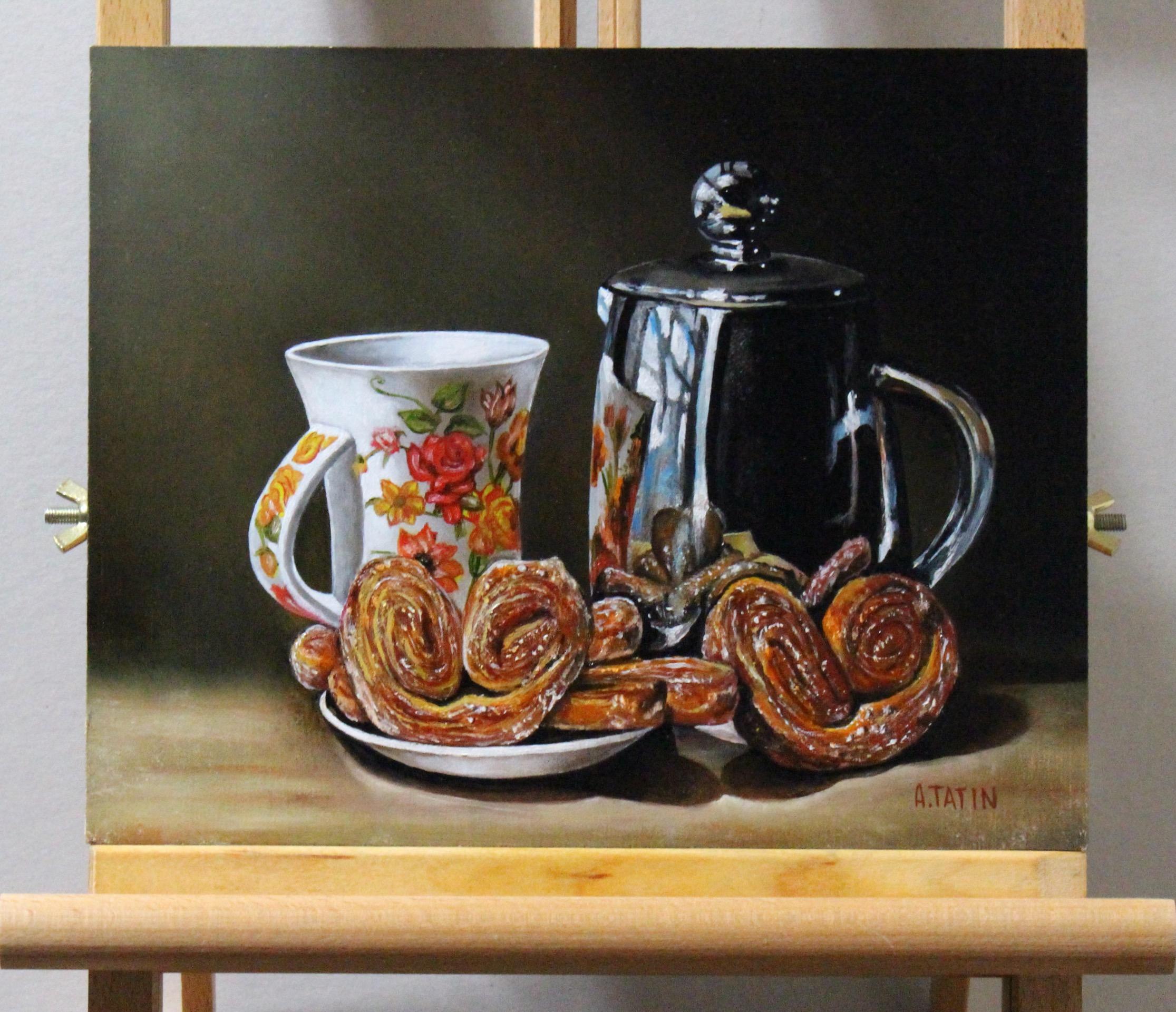 <p>Artist Comments<br />A floral-patterned mug stands beside a gleaming metal teapot accompanied by a plate of buttery, sweet palmier cookies. The polished stainless steel reflects the sky with billowing clouds. This still life exudes abundance and