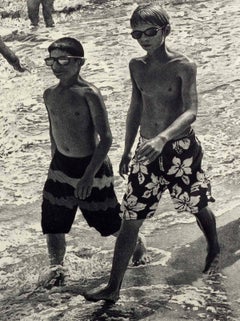Tidal Shift # 1 (Young bathers stroll on beach with others out in surf Montauk)