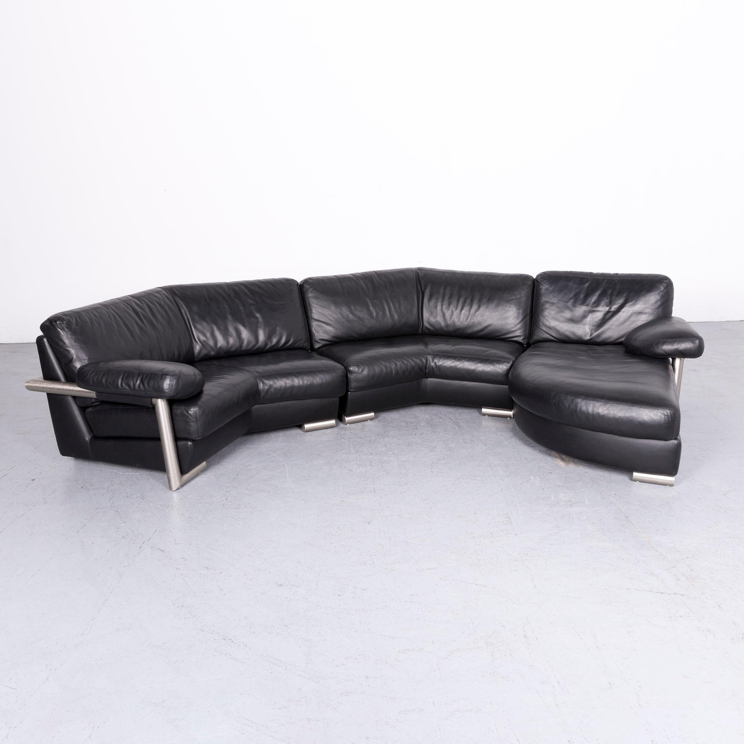 We bring to you an Artanova Medea designer black leather corner sofa.