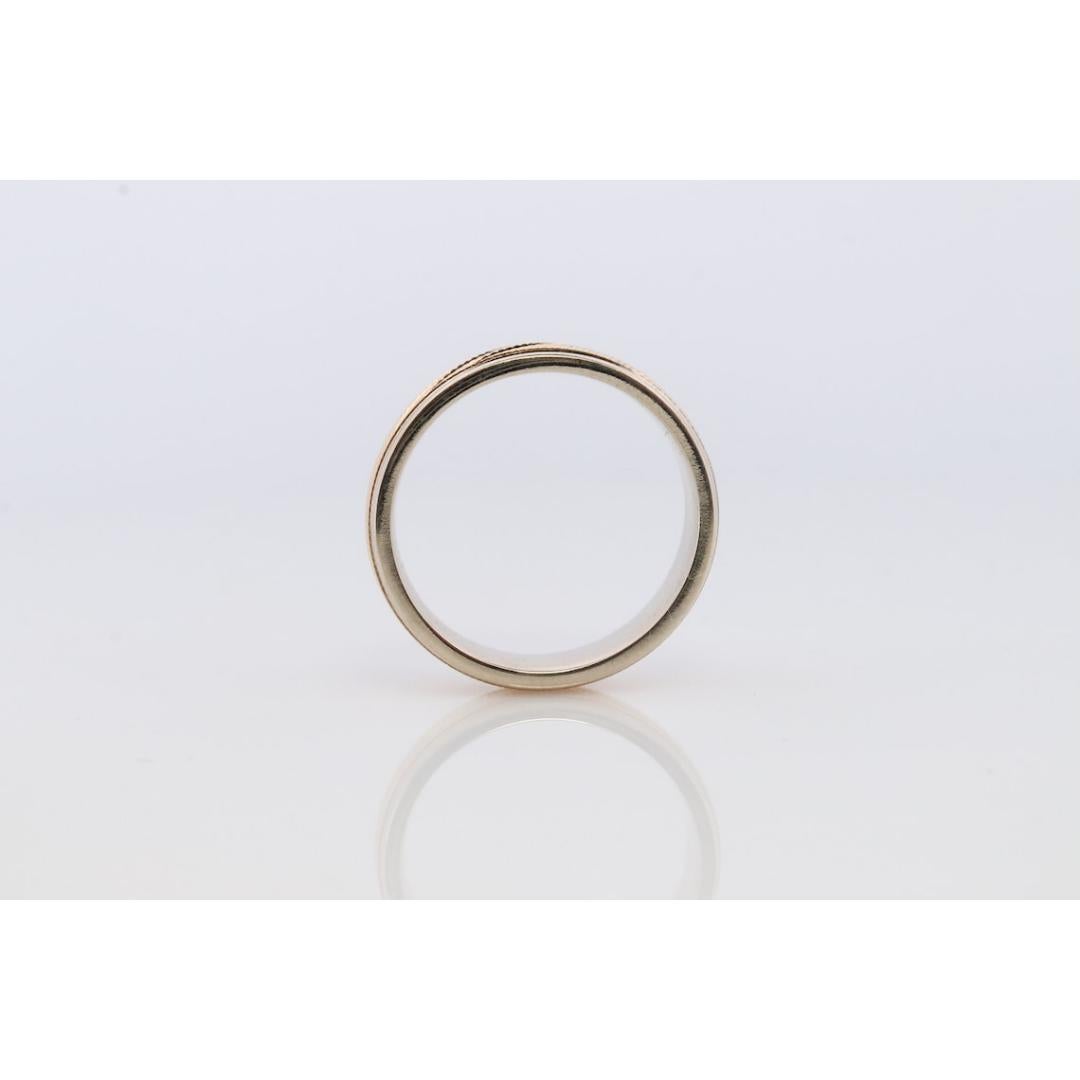 Vintage from the 1970s
Size: 8 US
Materials: Gold, Rose gold
Band Color: White

Style: Mid-century

Rare ARTCARVED JR WOOD 14k textured Wide wedding band.
Two tone- Yellow and White gold.

Size 8 so would work best for men but can be unisex. Comfort
