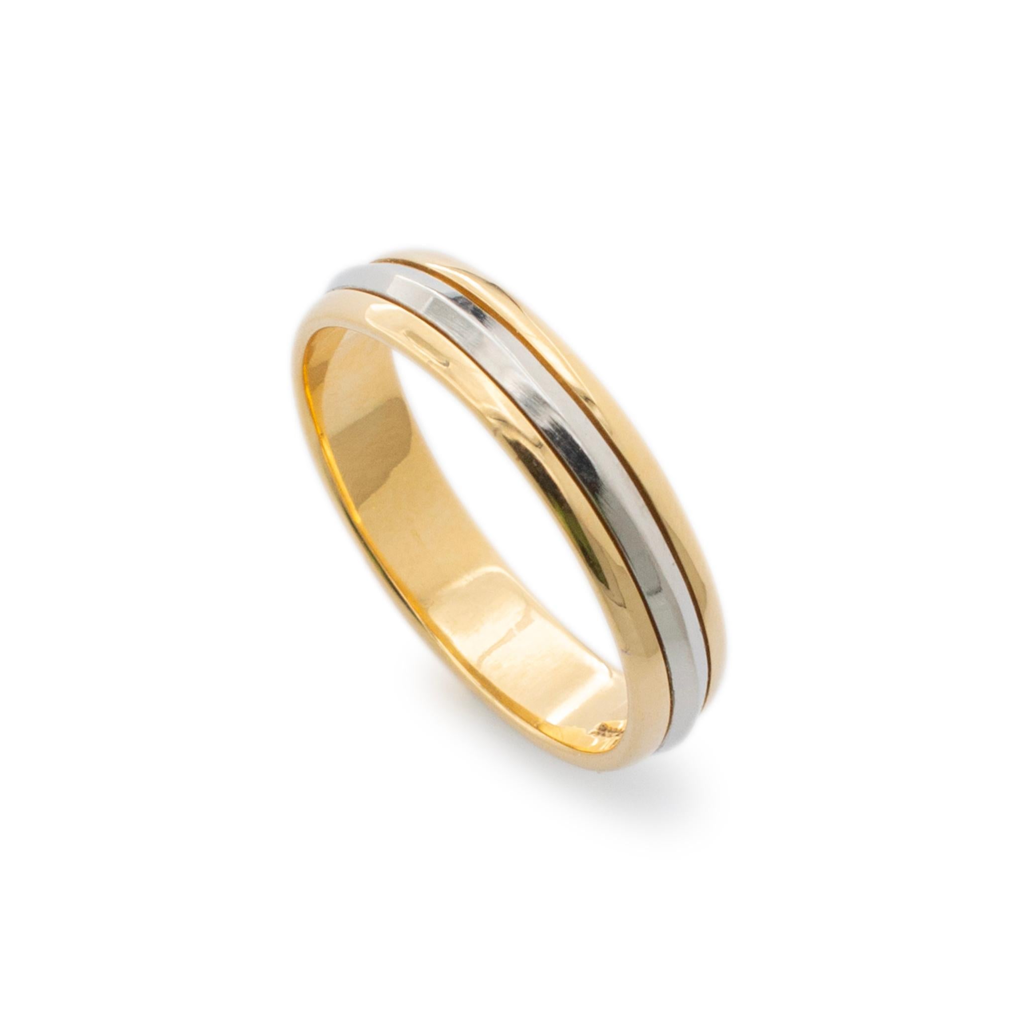 Brand: Artcarved

Gender: Men's

Metal Type: 18K Yellow Gold & Platinum

Size: 11

Shank Maximum Width: 5.00 mm

Weight: 7.20 Grams

Men's platinum and 18K yellow gold three-row wedding band with a half-round shank. The metals were tested and